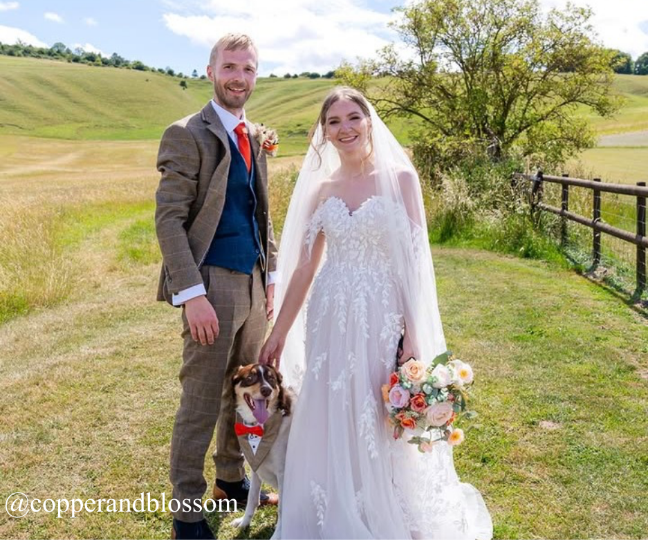 bride and groom with dog