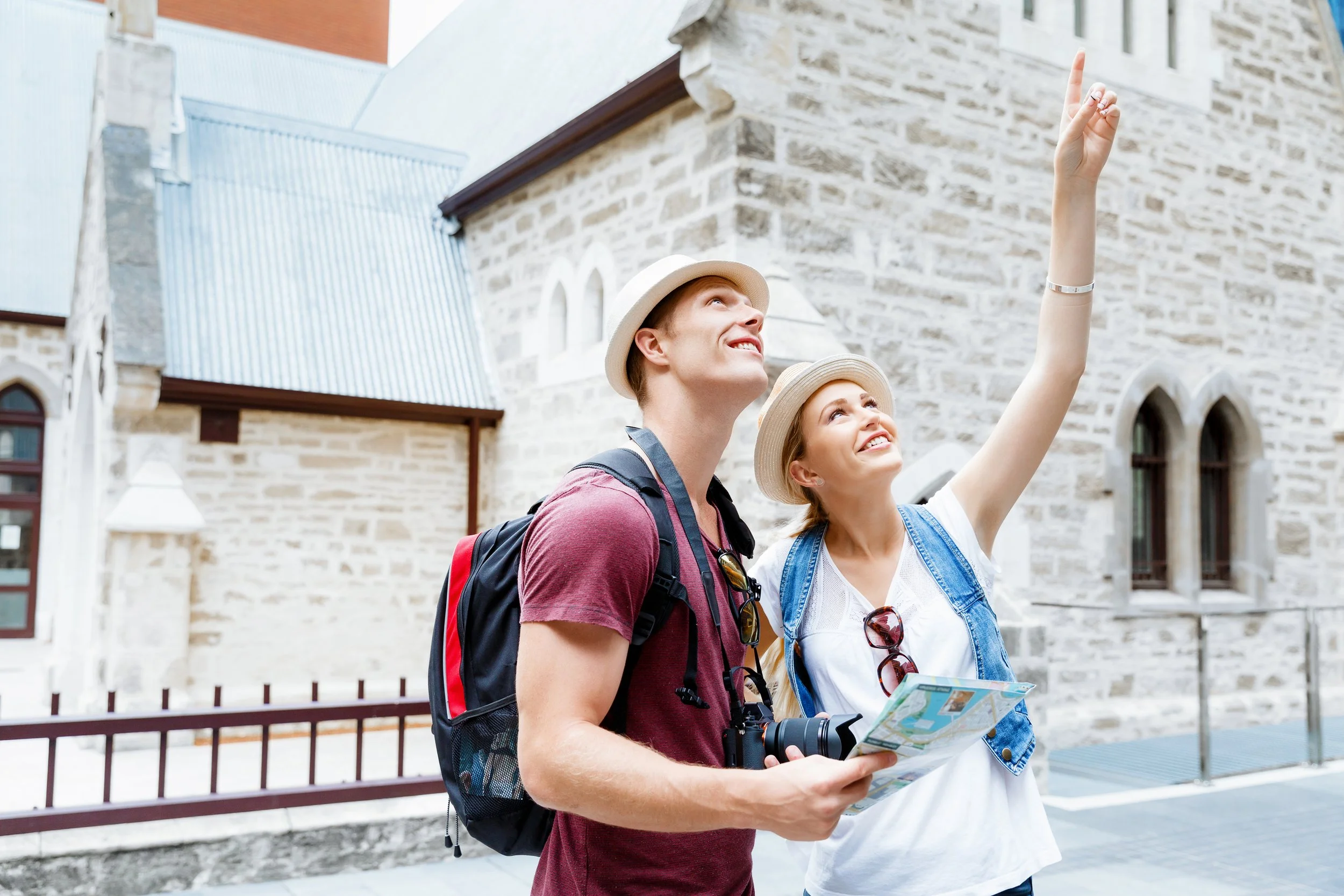 Happy young couple as tourists with a map, Sydney Australia Tourists