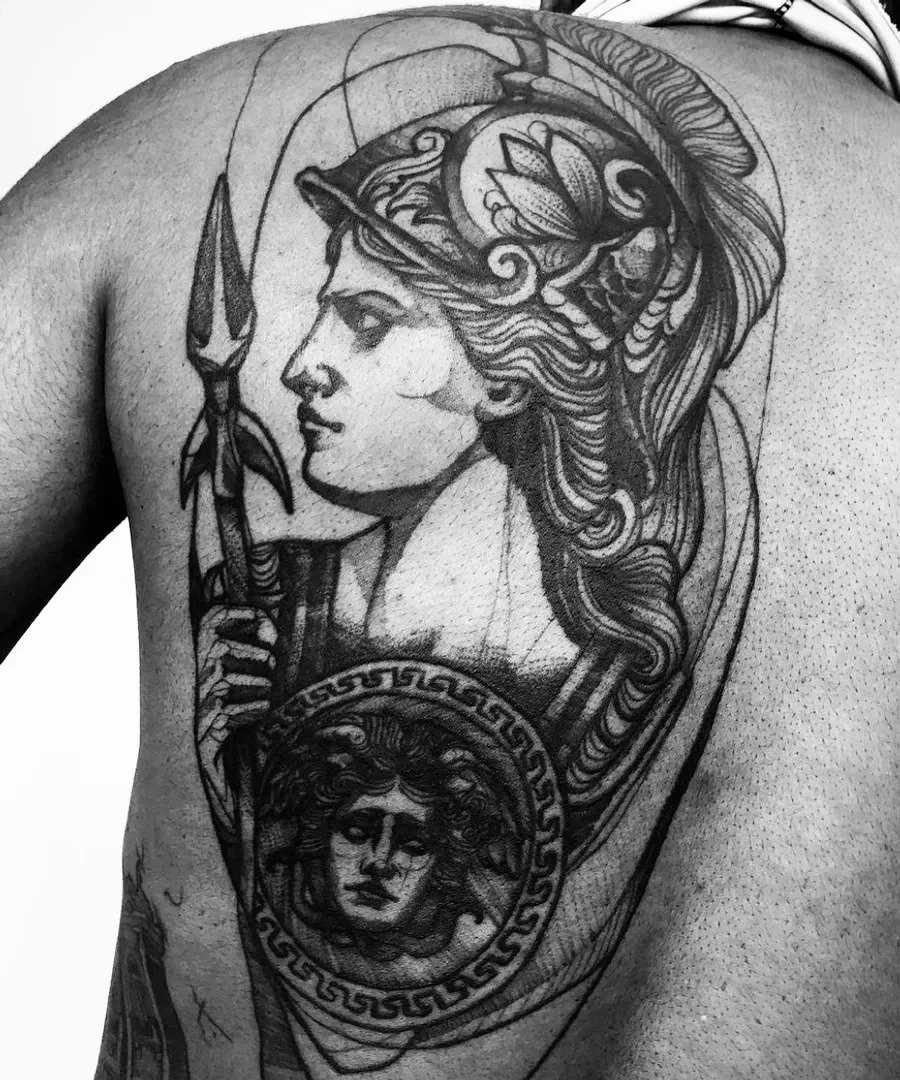Black-and-gray Roman goddess back tattoo with spear.