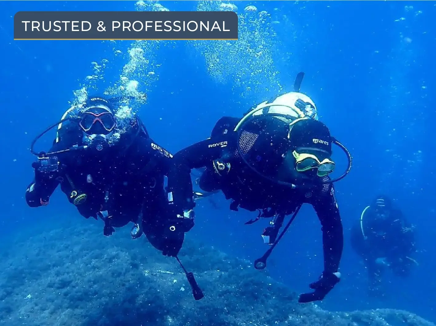 Scuba divers exploring an underwater of crystal clear sea, Diving Center Vir, Croatia