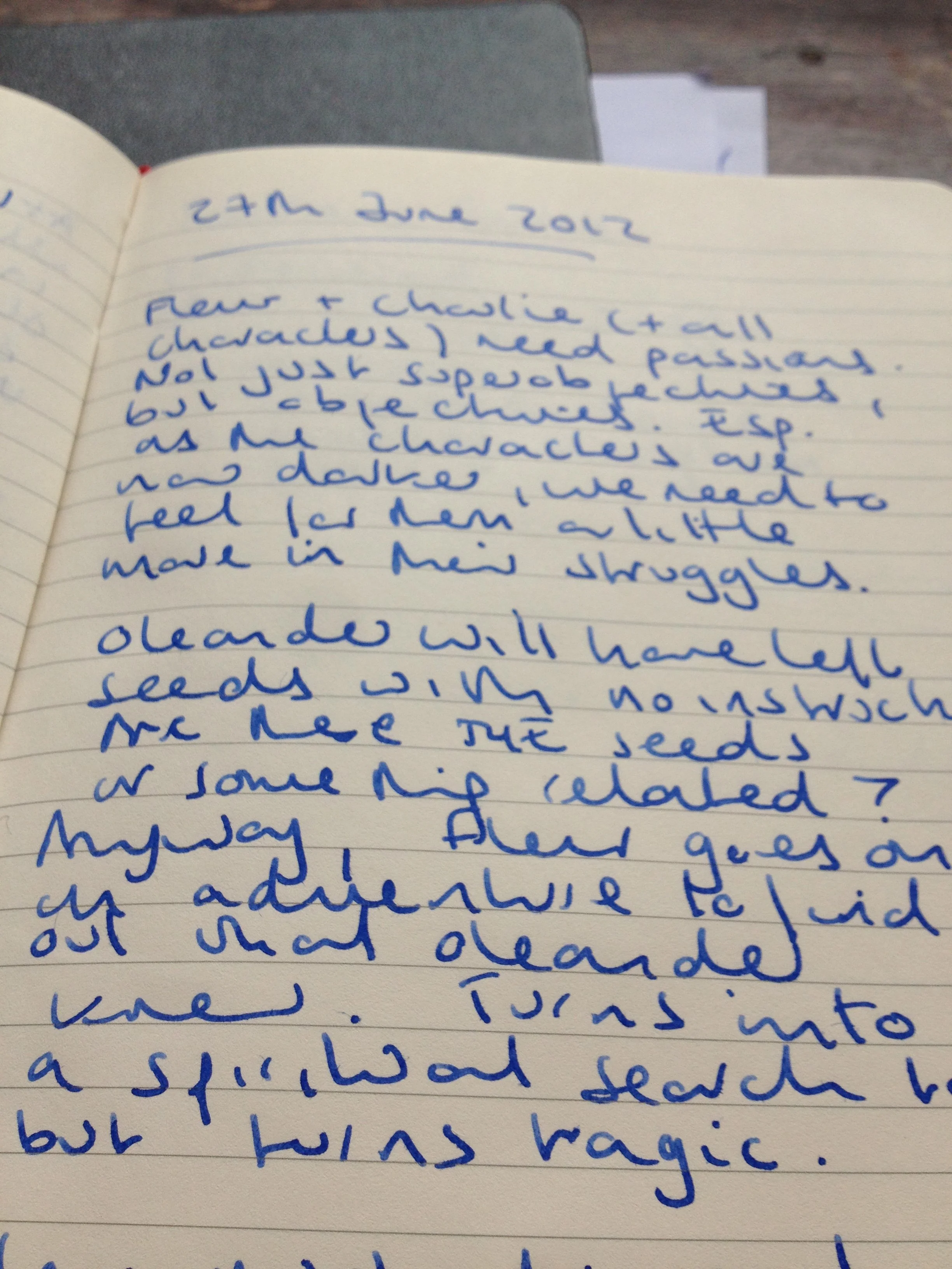 A handwritten journal entry on lined paper dated June 27, 2012, discussing gardening, planting seeds, and the process of growing plants.