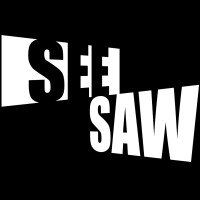 Text that says 'SEEL SAW' in a distorted, bold font.