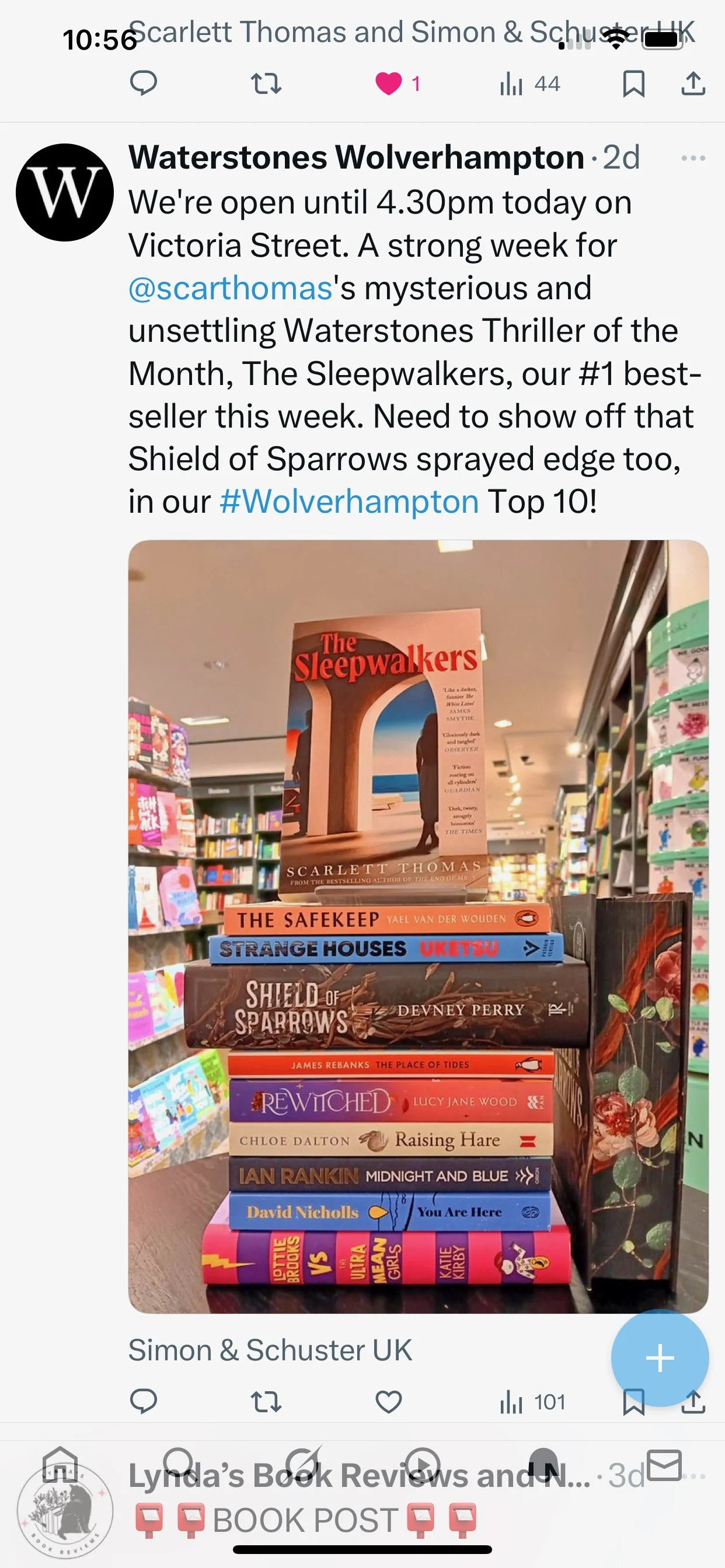 Stack of ten books on a table with a book titled "The Sleepwalkers" by Scarlett Thomas on top. The books include titles such as "The Safekeepers," "Strange Houses," "Shield of Sparrows," "The Place of Tides," "Rewitched," "Raising Hare," "Midnight an
