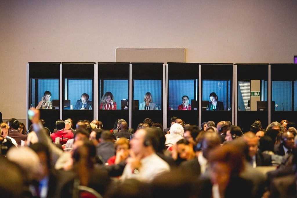 Why are two interpreters needed for simultaneous interpreting?