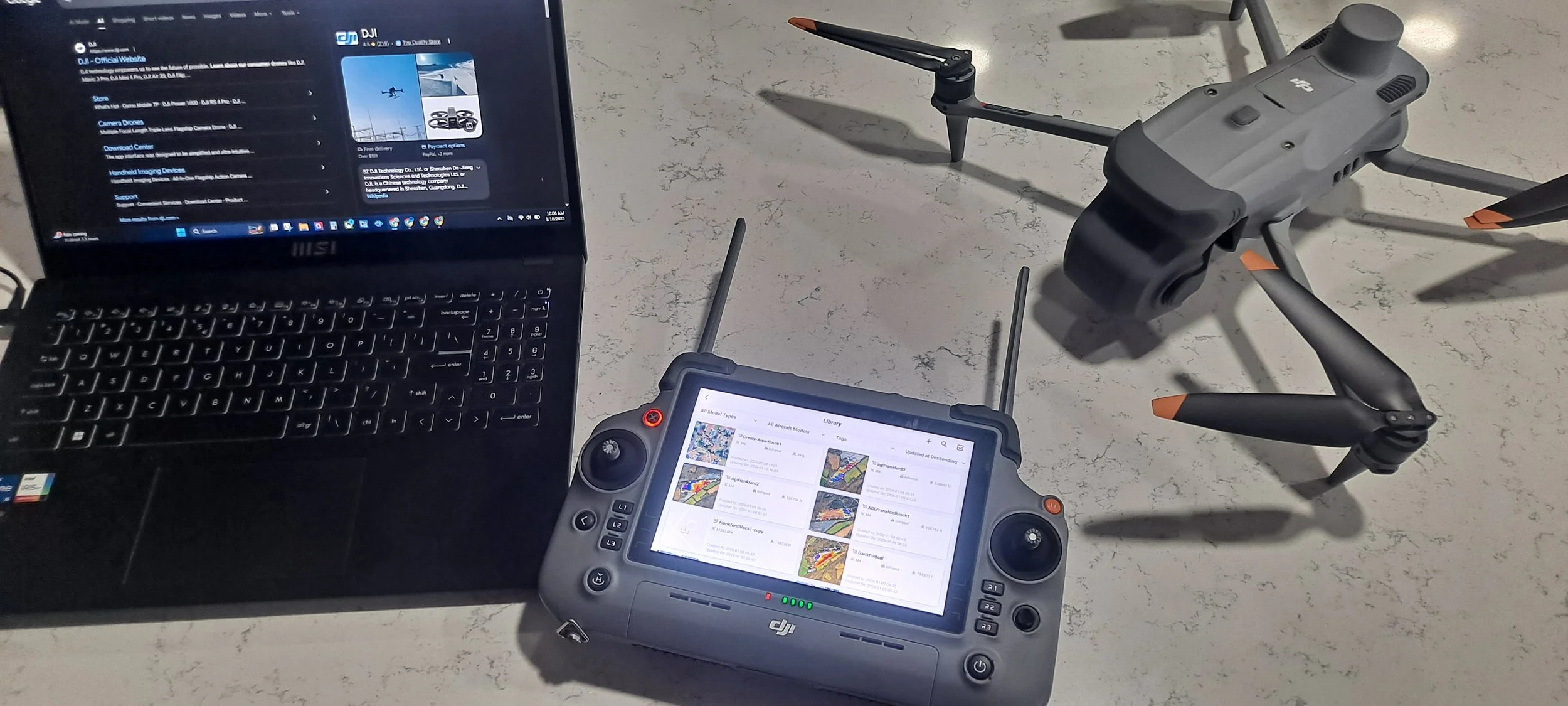 DJI Matrice 4E and controller, receiving programing for missions.