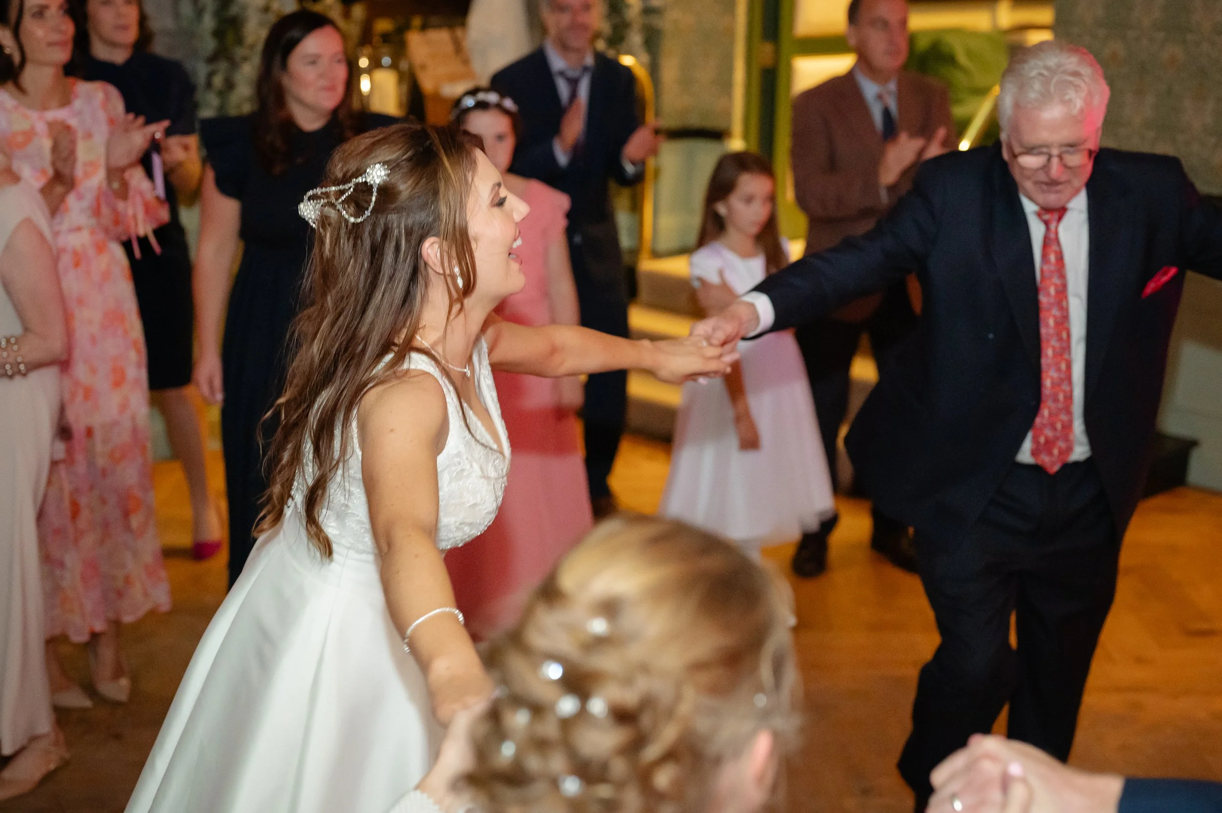 Meath wedding photographer capturing natural, documentary‑style moments at The Station House Hotel, focusing on authentic emotion, artistic detail, and joyful storytelling throughout the wedding day.
