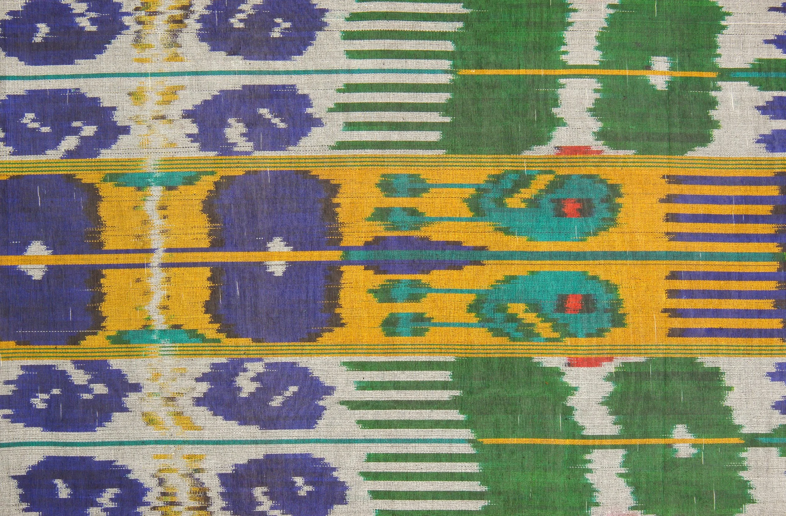 Colorful white, purple, green, and blue fabric