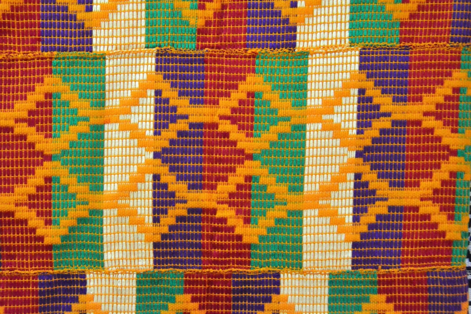 Fabric sample blue, brown, and gold zigzag pattern