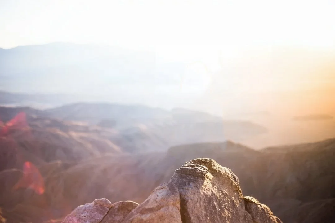 Image looking across rocky scenery at dawn.