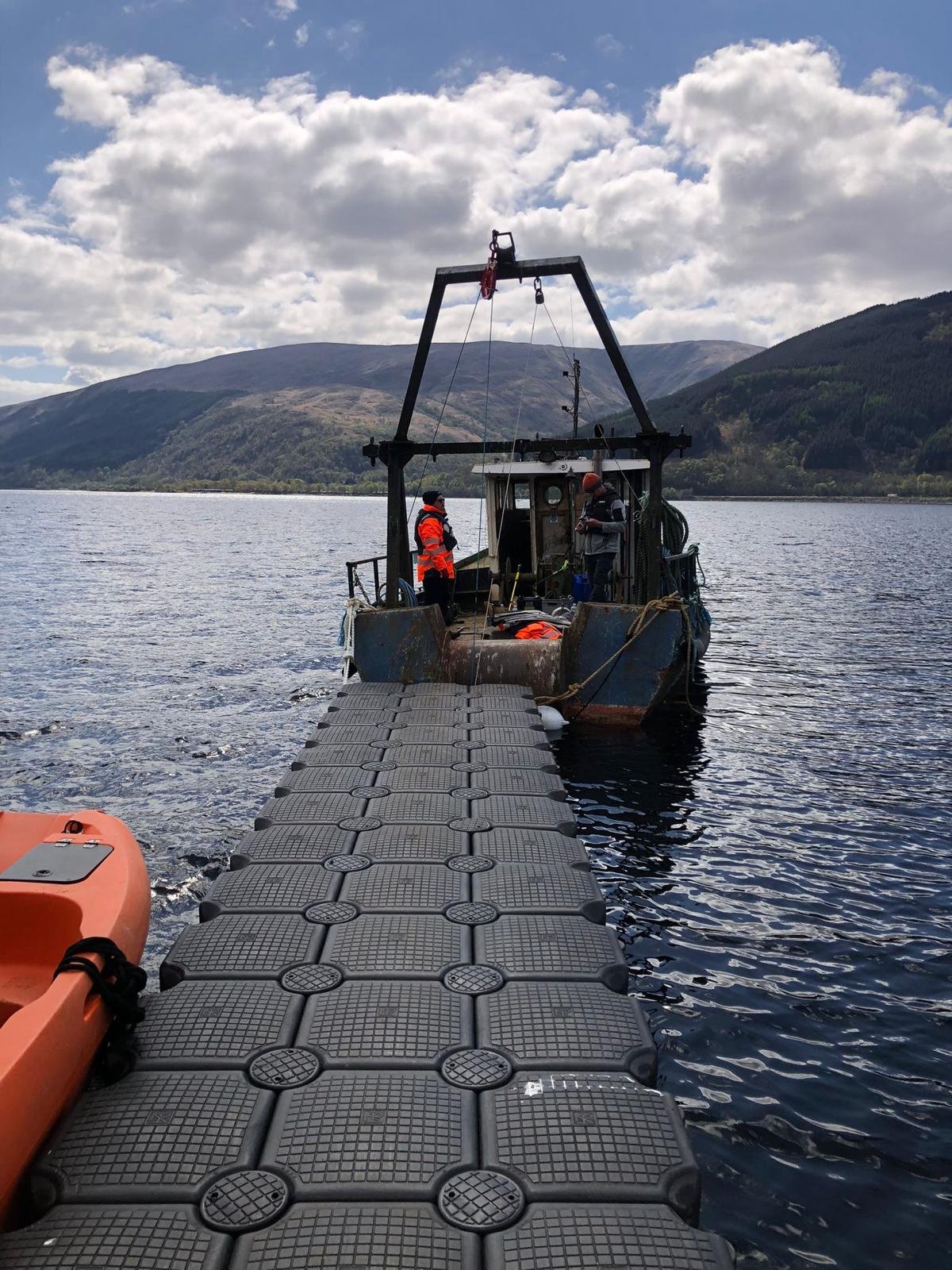 Floating Pontoon with safety and work boats