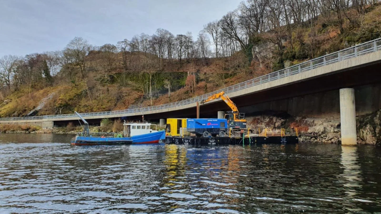 Work Boat assisting with bridge construction