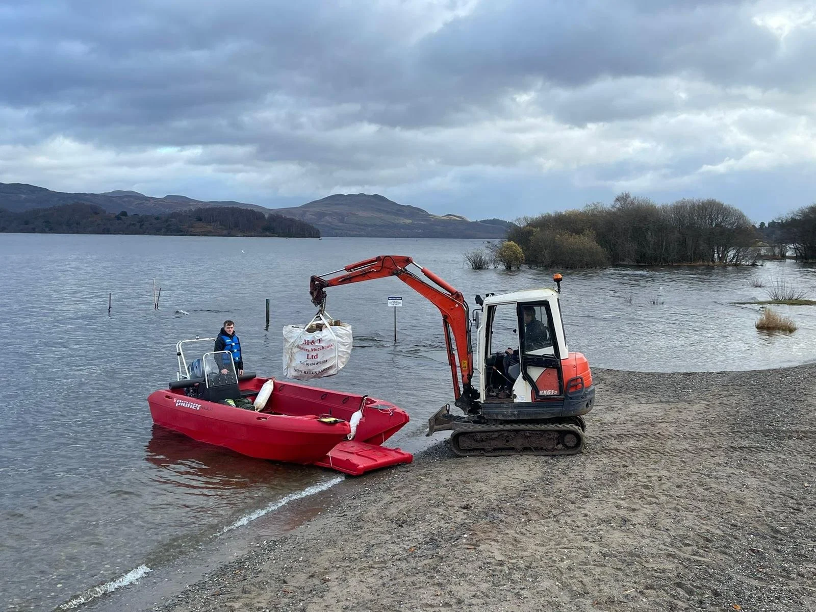 Safety Boat and Digger on Loch Lomond shore