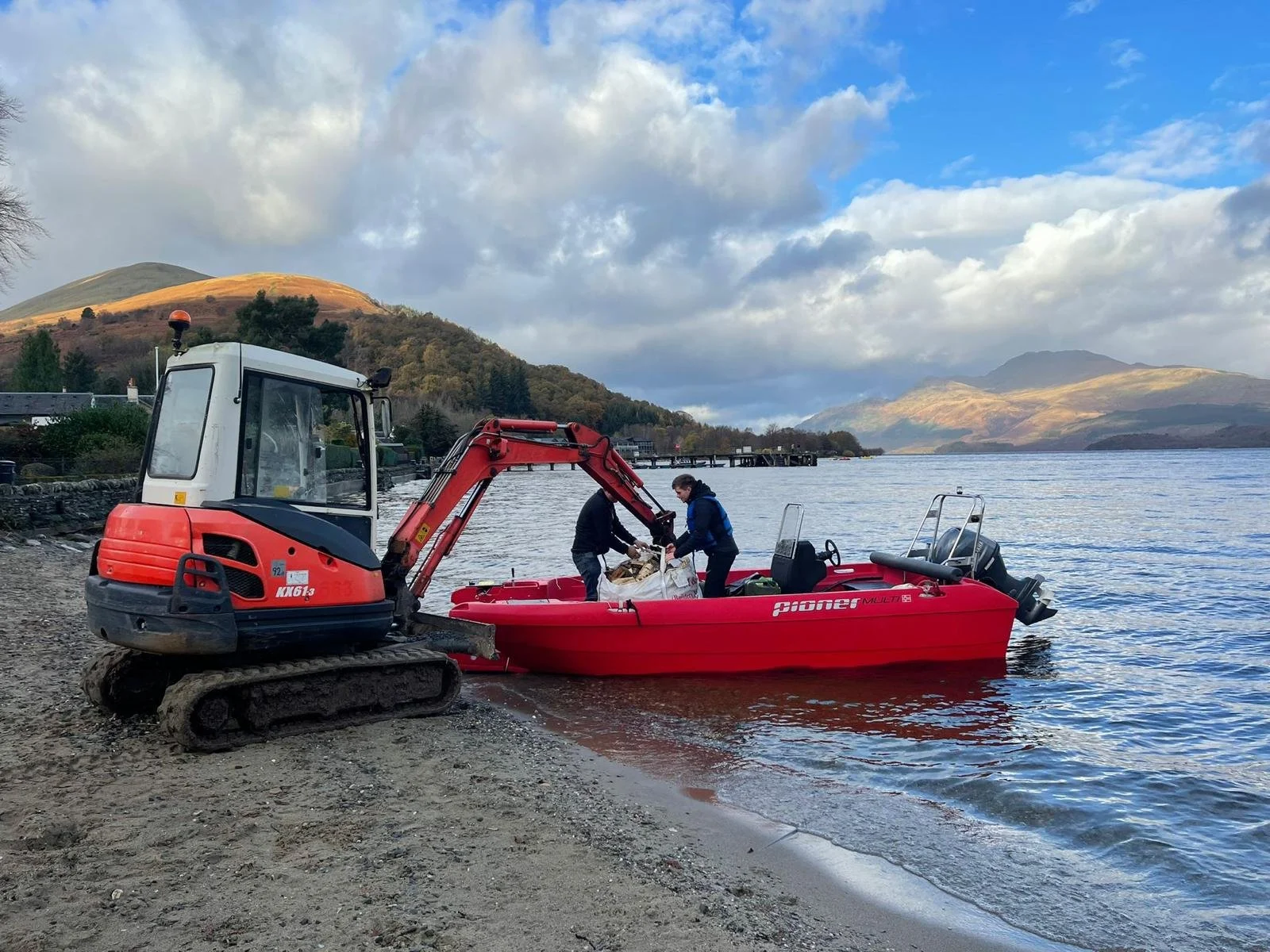 Safety Boat and Digger on Loch Lomond shore