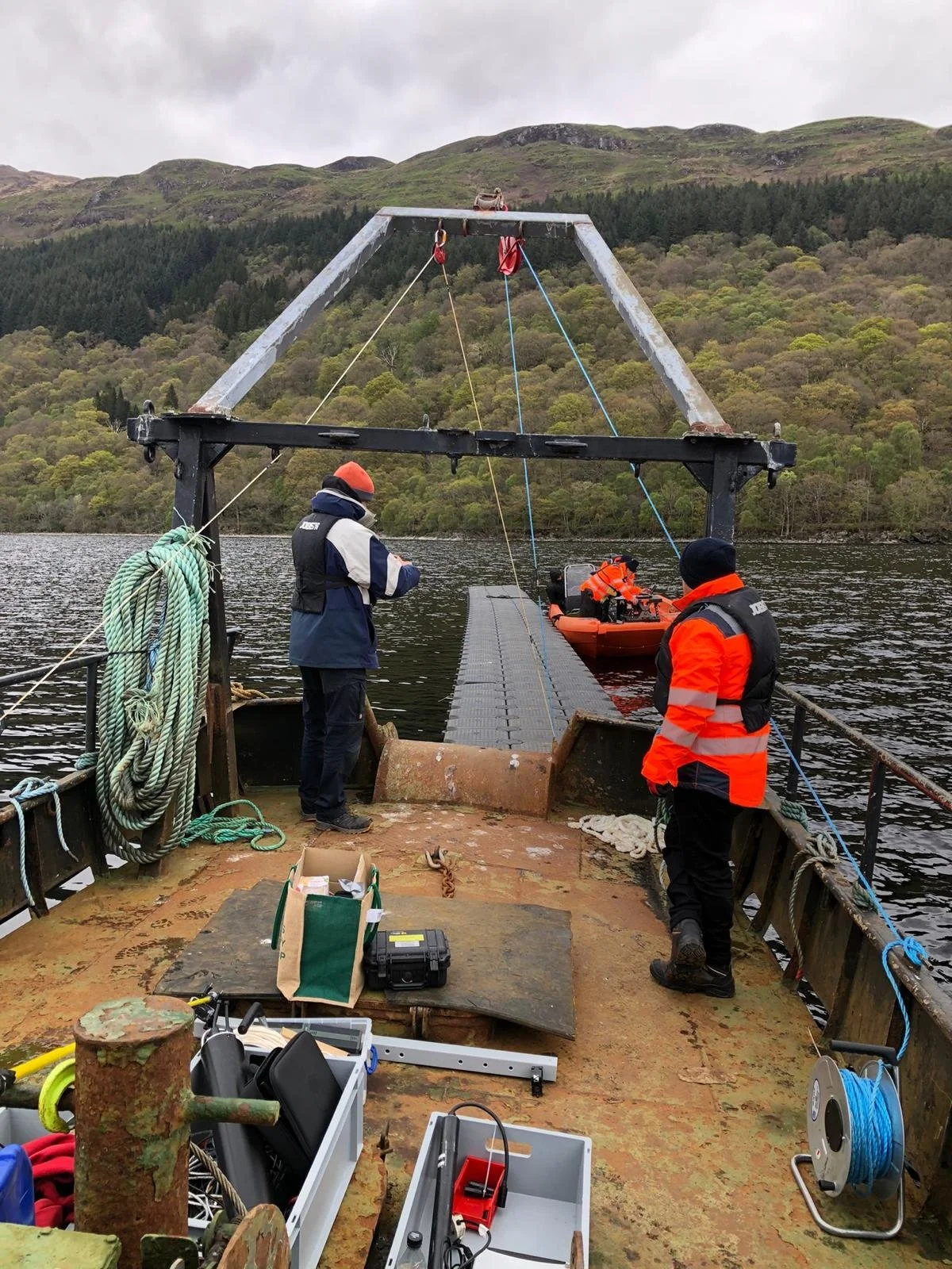 Work boat, safety boat & floating pontoon on Loch Lomond