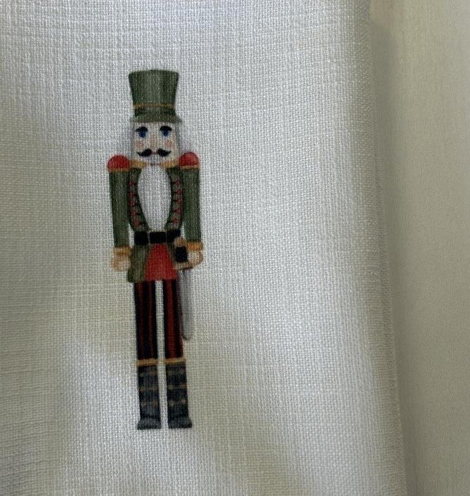 Green Nutcracker on White Panama Napkins