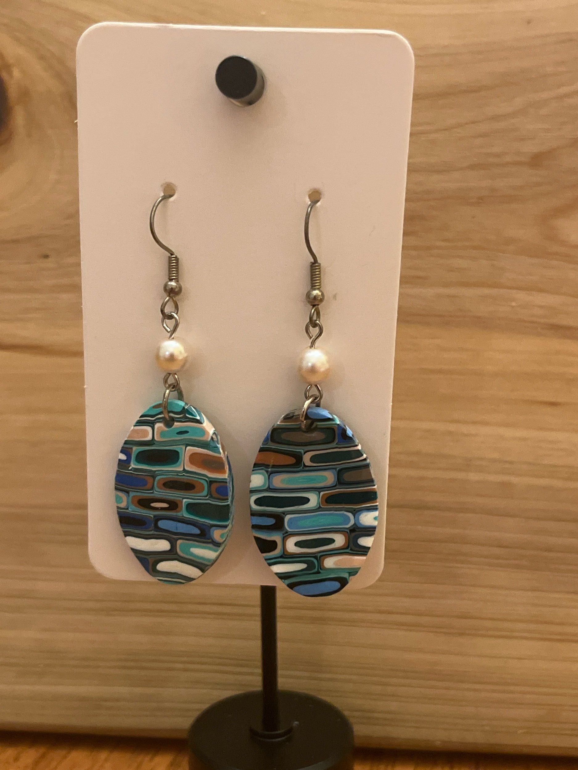 Aqua and terracotta colored polymer clay earrings with brick pattern
