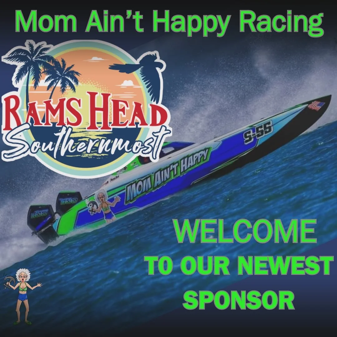 A colorful boat on water with a logo that reads 'Rams Head Southermost' and a text overlay that says 'Mom Ain't Happy Racing' at the top and 'Welcome to Our Newest Sponsor' at the bottom, with a background of a tropical sunset, palm trees, and a bird.
