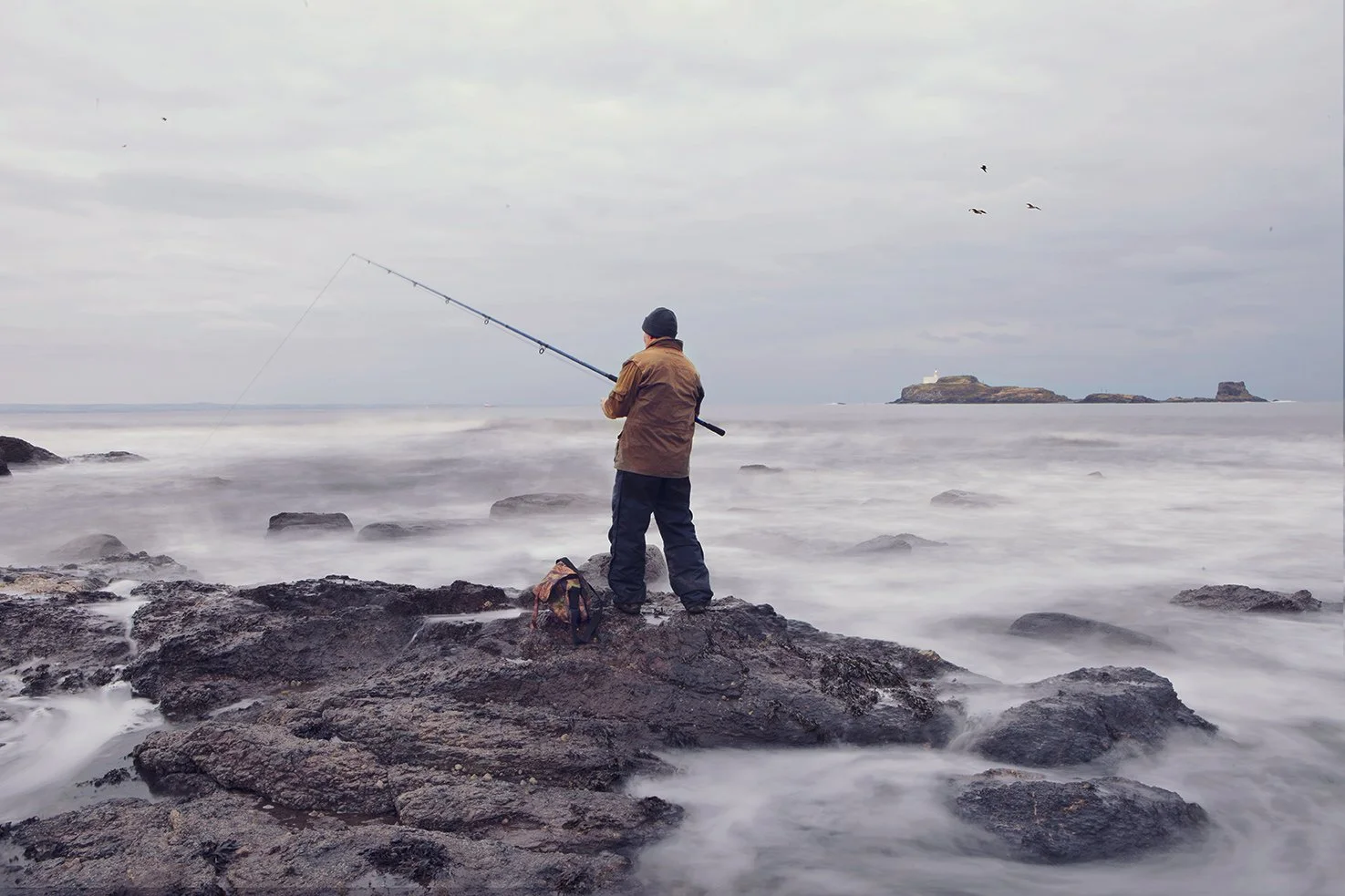 Fisherman-on-Rocks.jpg