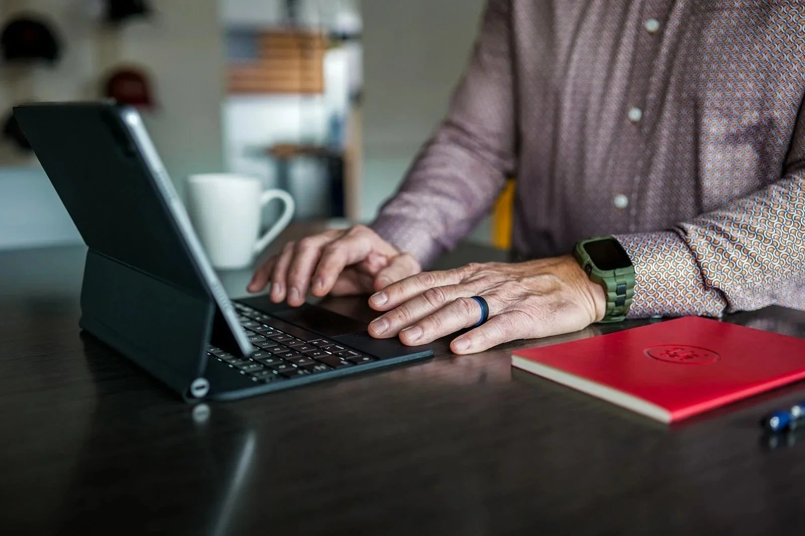 Man on laptop researching how to reduce owner dependency.