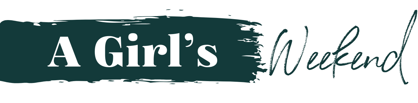 Text saying 'A Girl's Weekend' in stylized font with brushstroke background