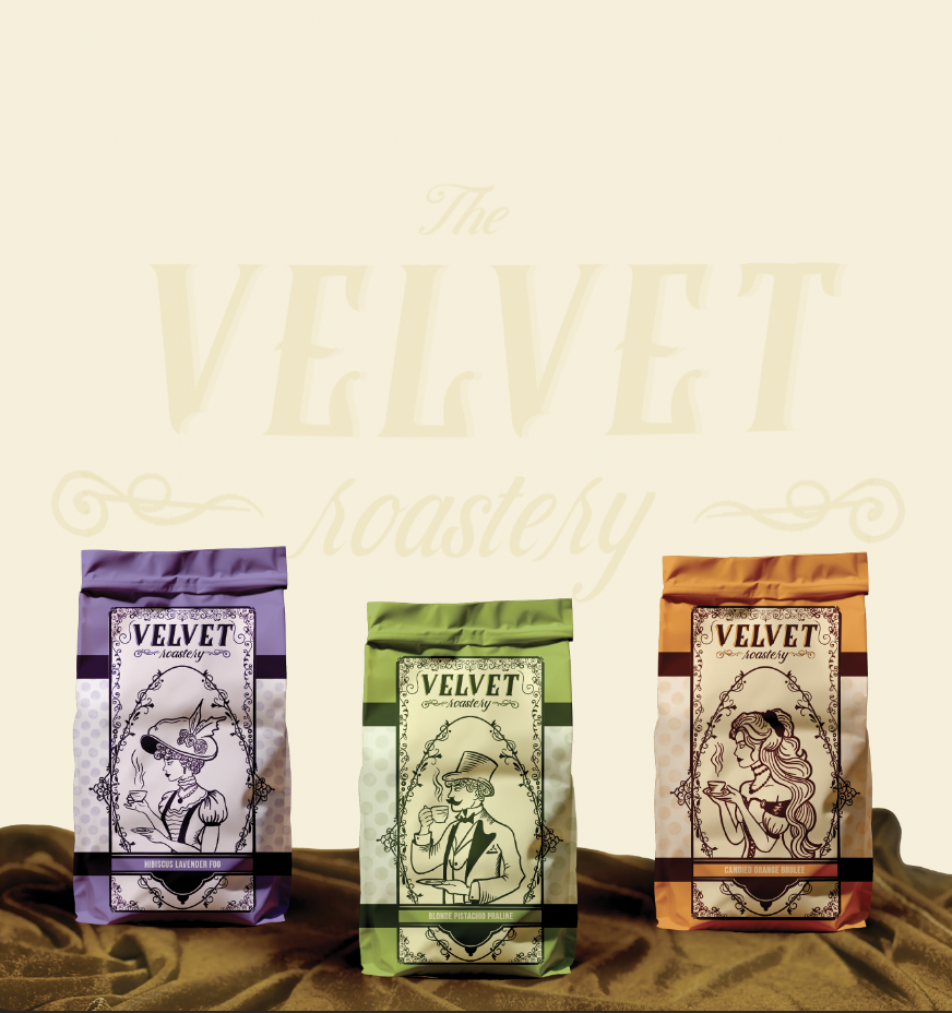 Three colorful packages of velvet roast coffee. Purple, green, and orange packaging with vintage line art of women and a man on each, set on a brown fabric with a light beige background featuring the words 'The Velvet Roastery' in faint, stylized tex