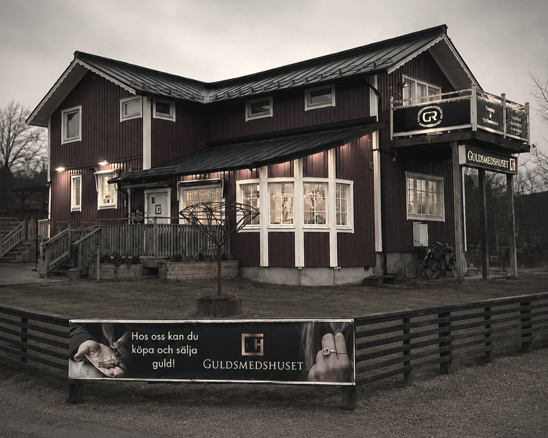 Guldsmedshuset i Sävedalen med skylt för köp och försäljning av guld.