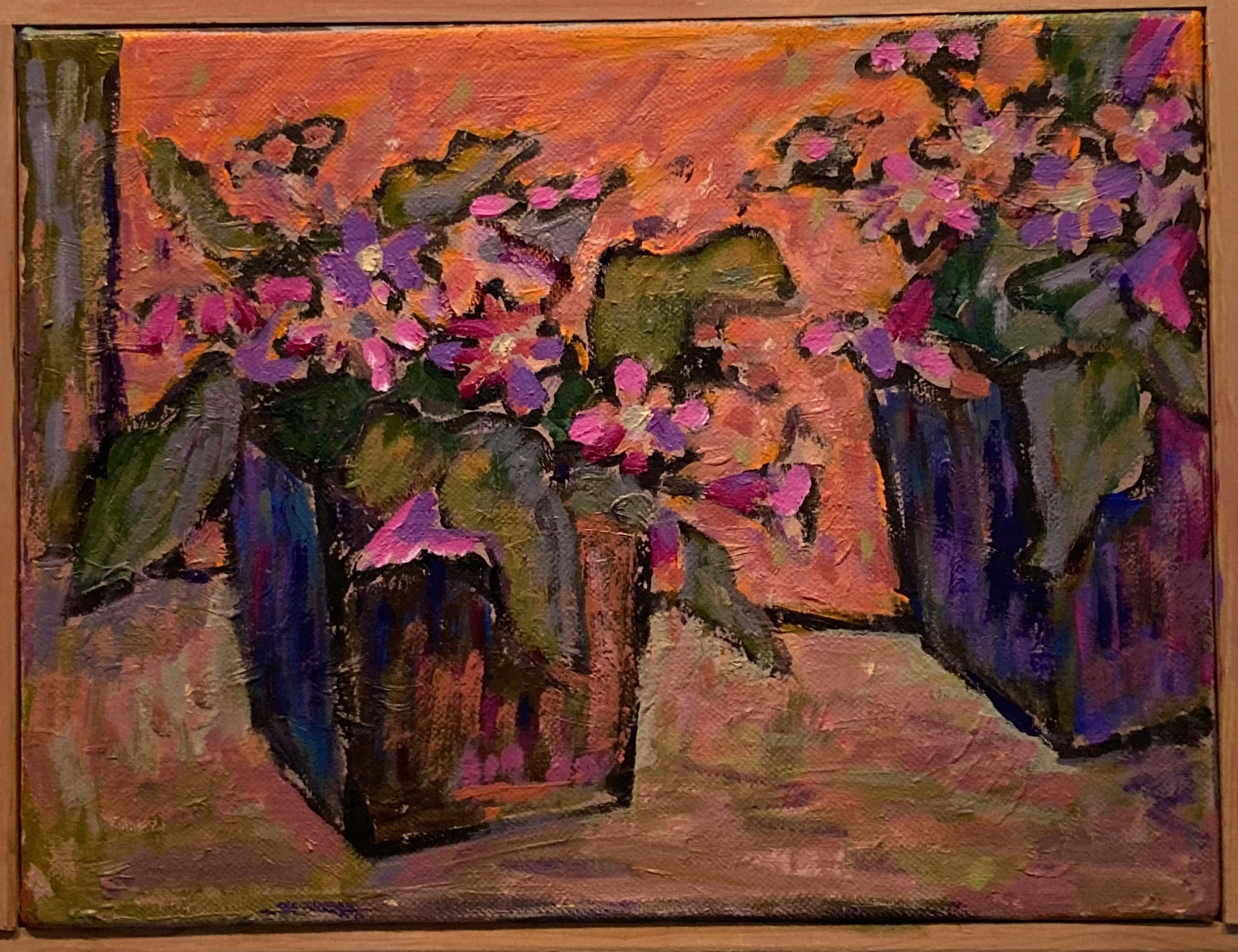 An abstract painting of two flower arrangements in black pots with pink, purple, and green flowers on an orange background.