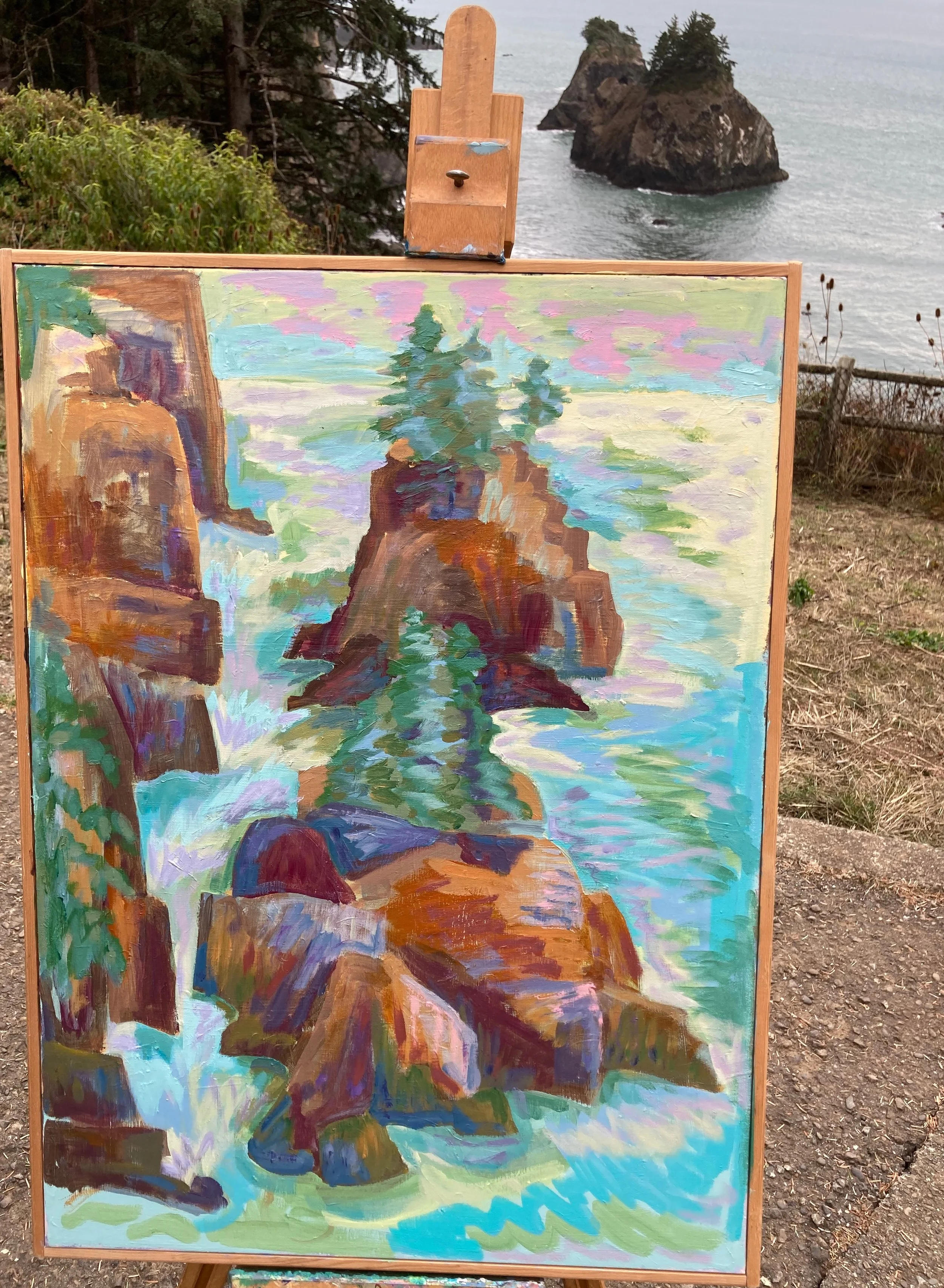 A colorful landscape painting of a rocky coastline with a large ocean wave crashing against rocks, featuring a small evergreen tree on a rocky outcrop, with distant sea stacks and a cloudy sky in the background.