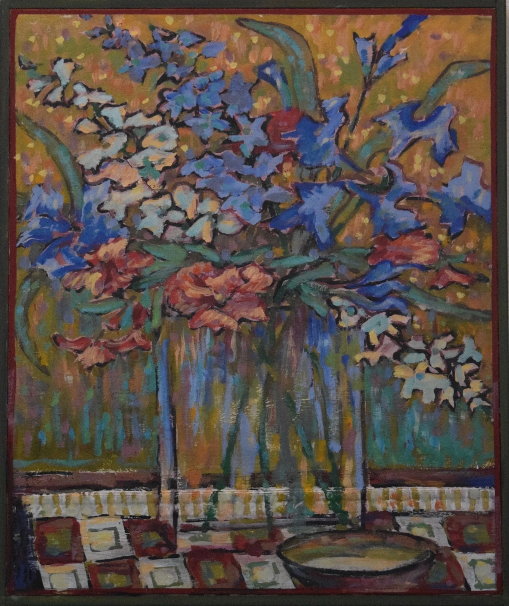 Impressionist style painting of a colorful floral arrangement in a glass vase on a patterned table, with a bowl in the foreground.