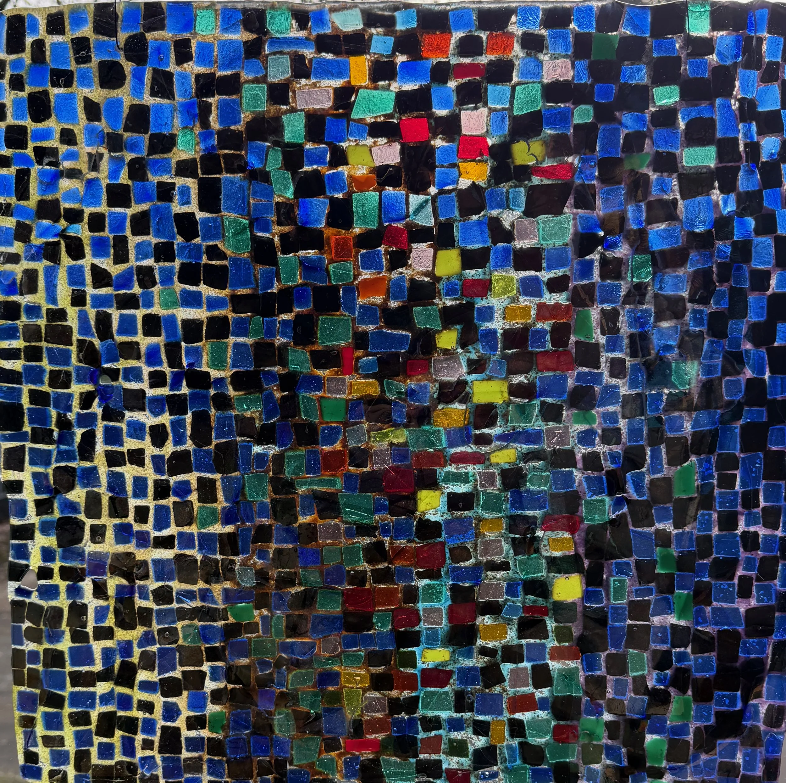 Colorful mosaic artwork with various small square tiles.