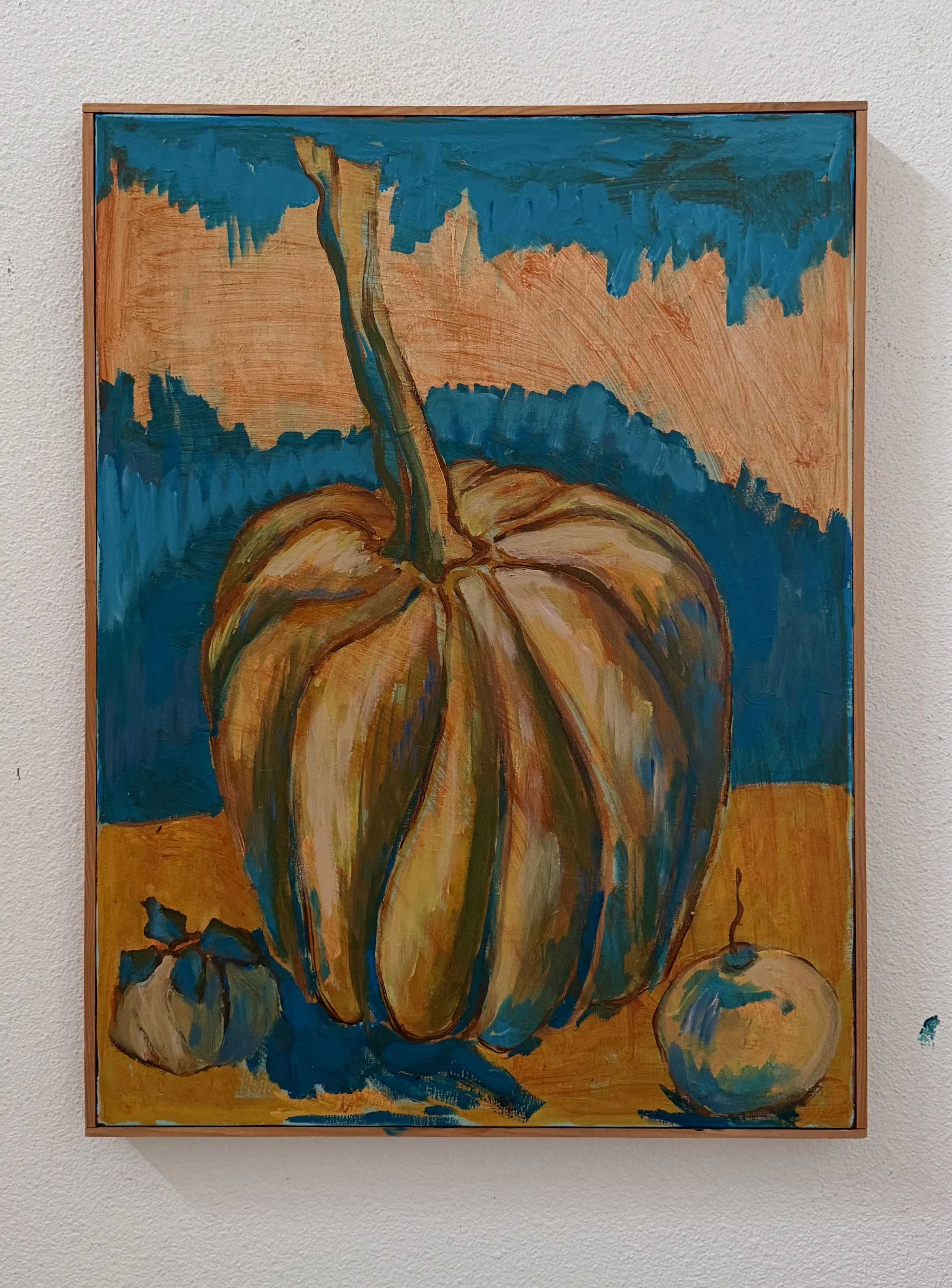Painting of a pumpkin with a smaller pumpkin and an apple-like fruit, using bold brushstrokes and vibrant colors, with a blue sky background.