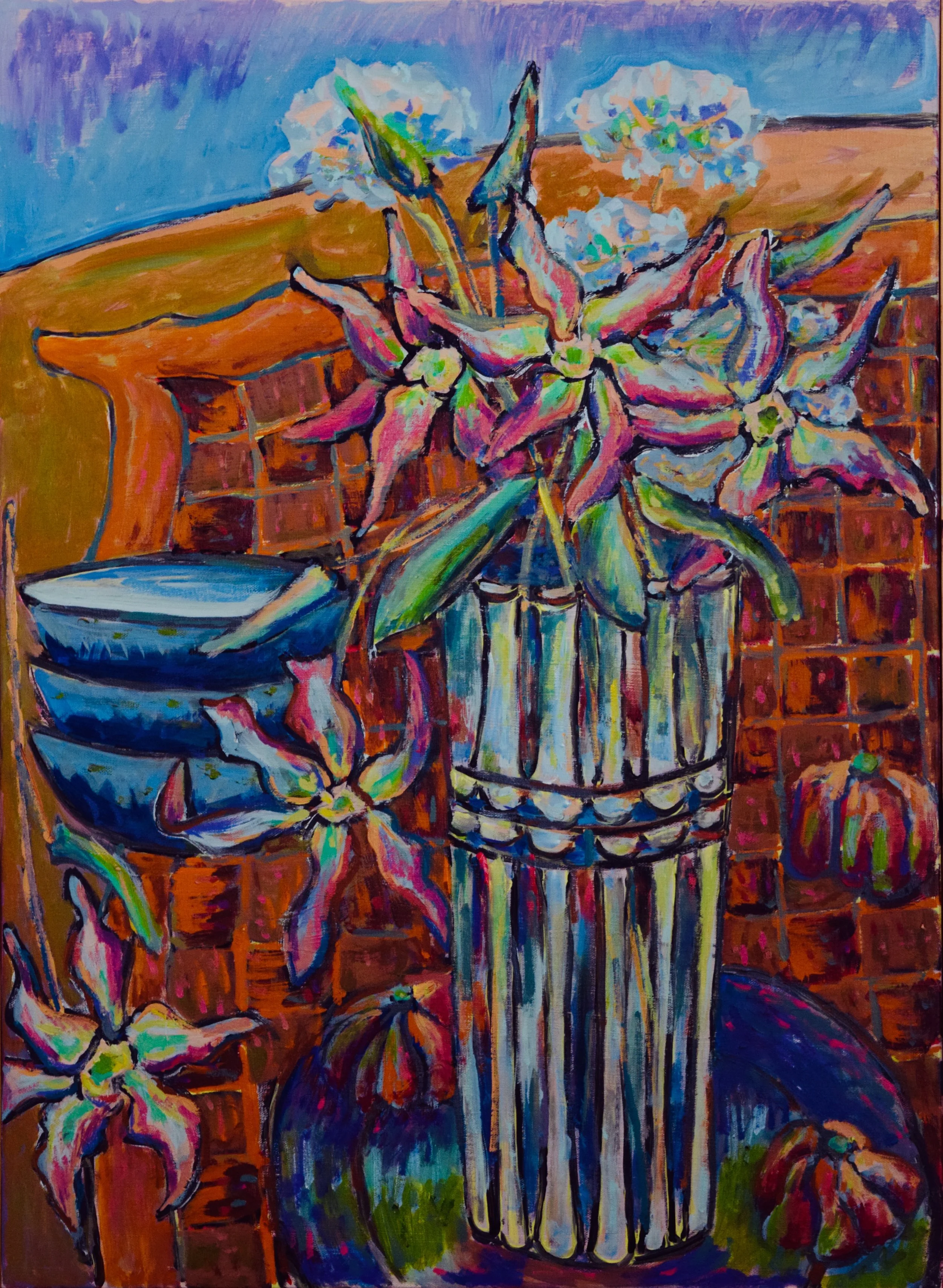 Colorful painting of a tall striped vase with white and pink flowers, surrounded by blue bowls, set against a brick background.