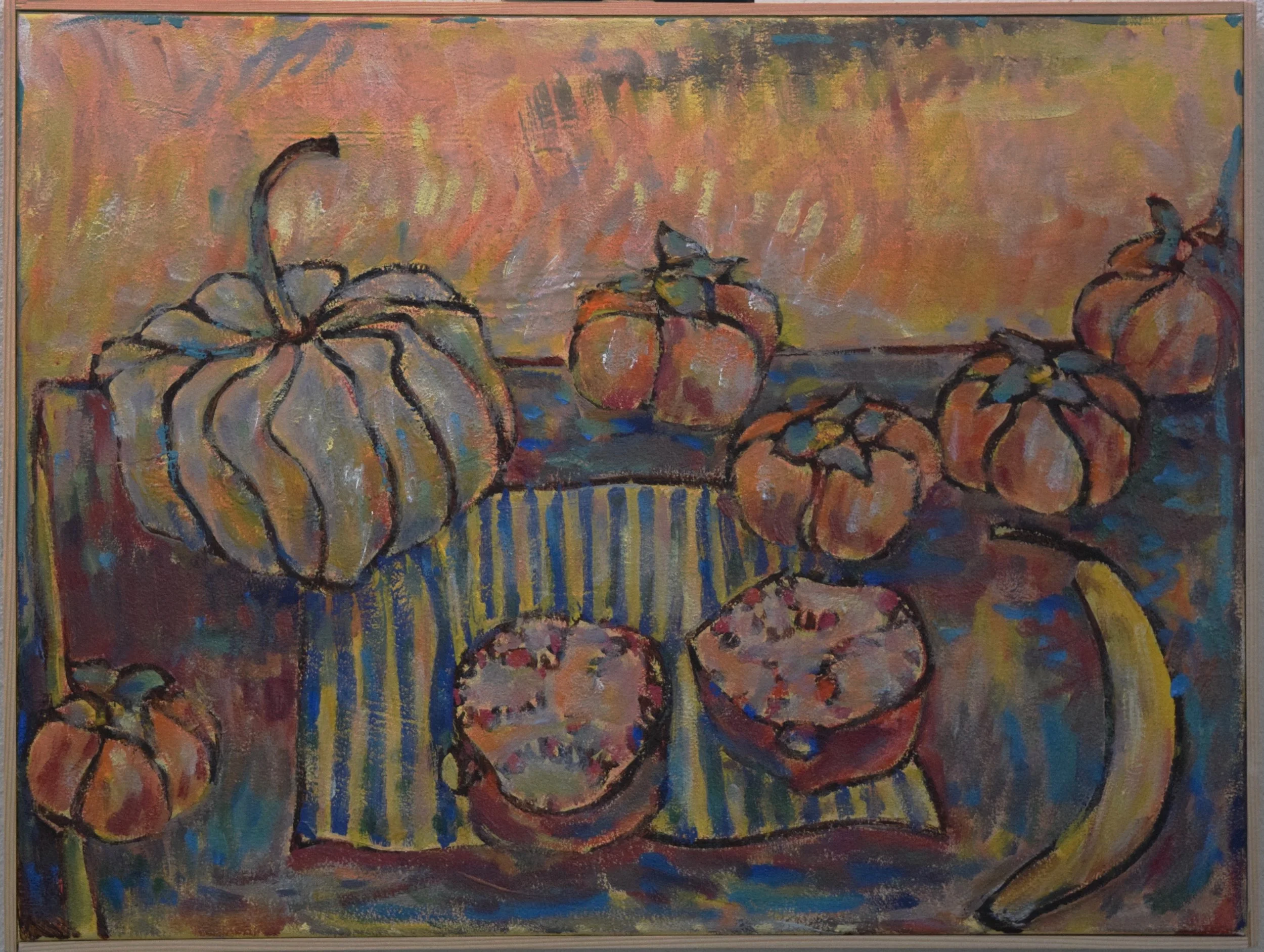 Painted still life of pumpkins and a banana on a striped cloth, with warm background colors.