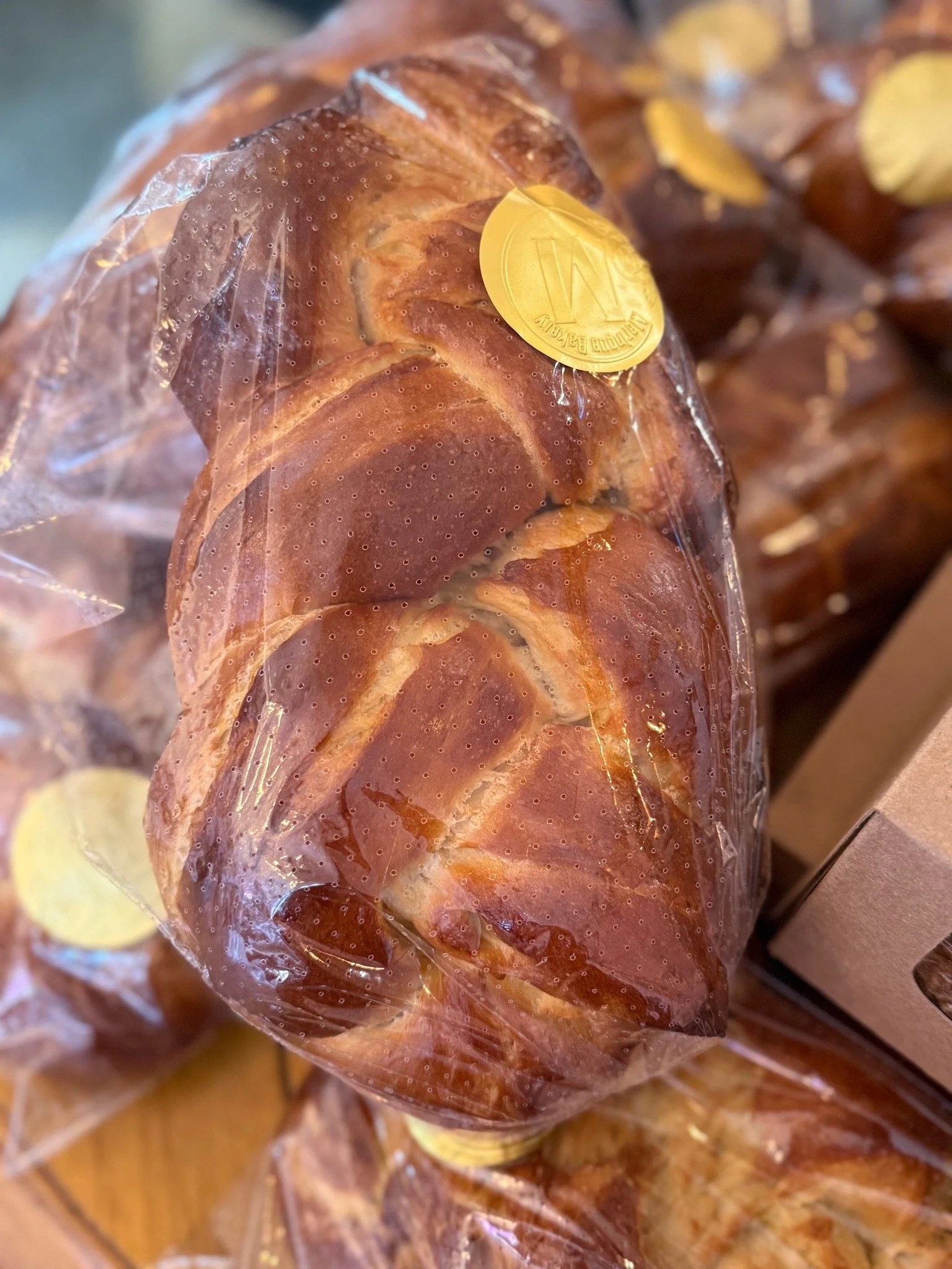 Did you know that we make a great big pile of braided challah loaves every Friday here at Meringue?  Challah is a soft, pillowy, slightly sweet enriched bread that would make the best sandwich or French toast of your whole weekend!  We make it using 