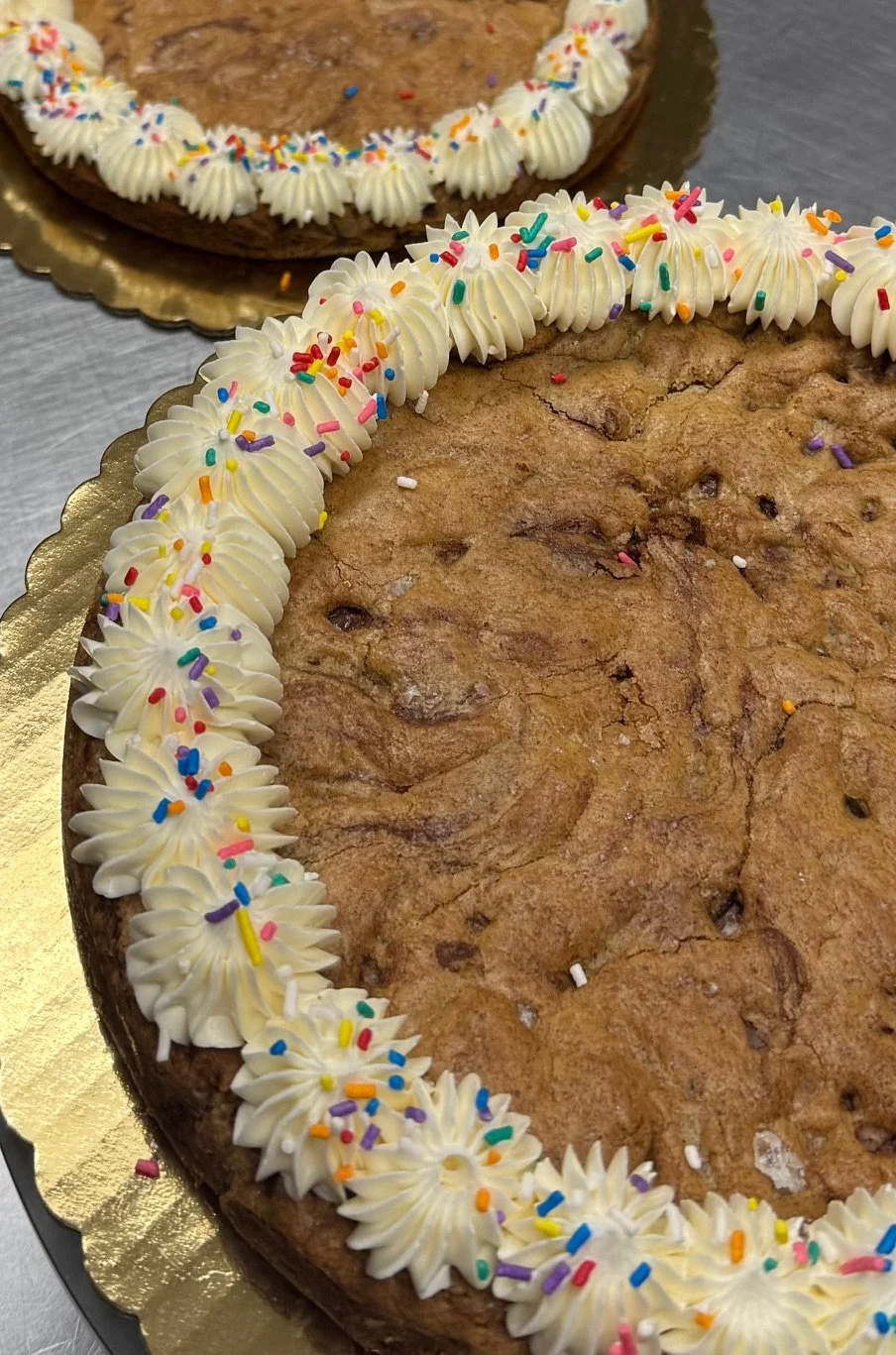 Did you know that weekends are for cookie cakes?  We don't make the rules, so we just tucked THREE of our 10" brown butter chocolate chip cookie cakes in our bakery case just for you.  We hope you enjoying this beautiful spring day, and hope we 