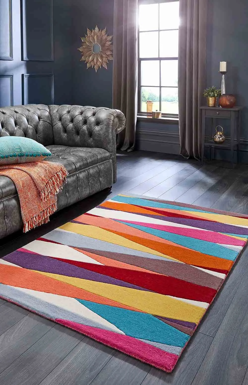 Colourful british made rug in dark room - available from Cornwall flooring and home Co