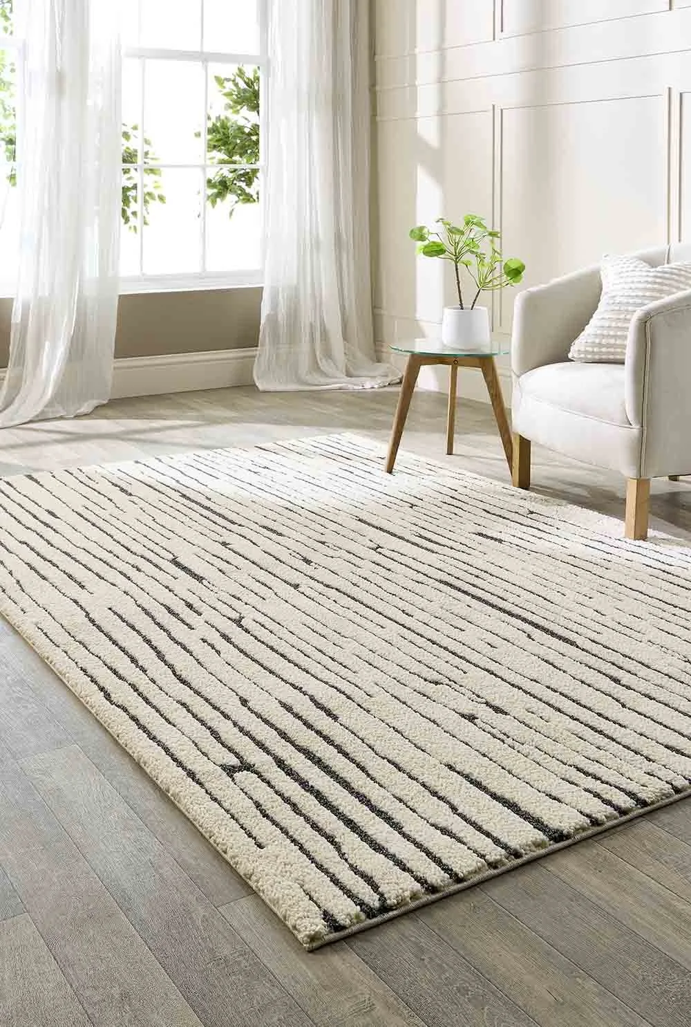 Stunning British made rug, white with black detail from Cornwall Flooring and Home Co