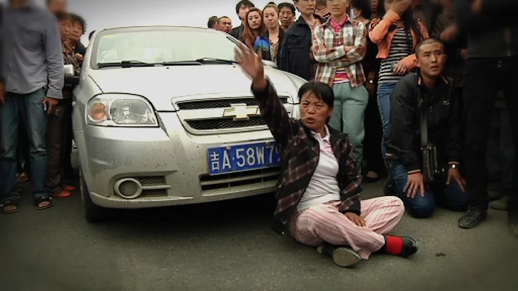 Families Protest Factory Blast