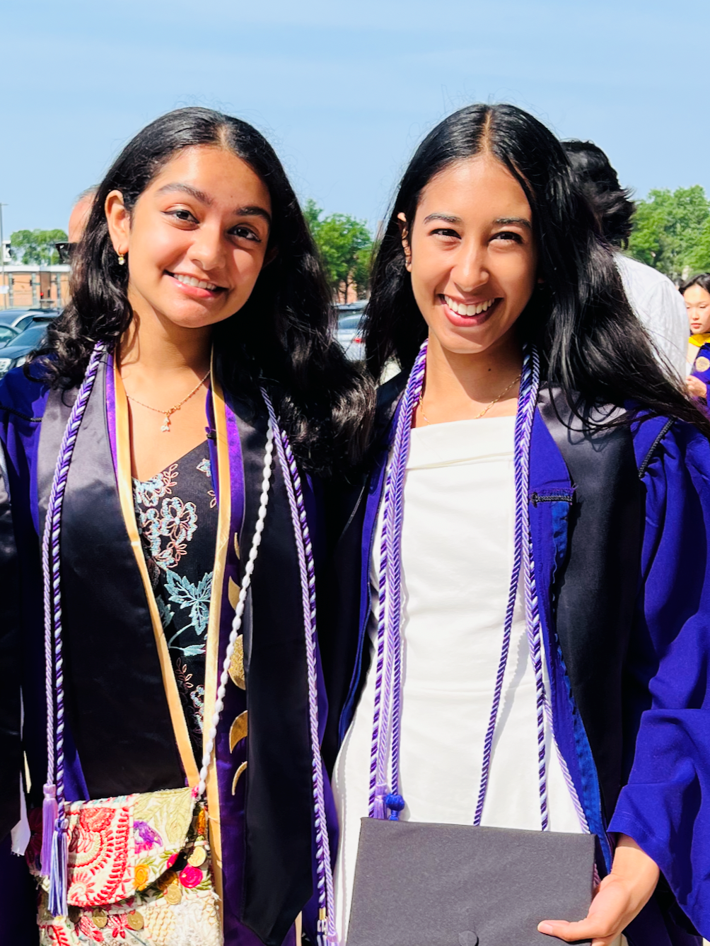 Neha and Divya at graduation (2025)