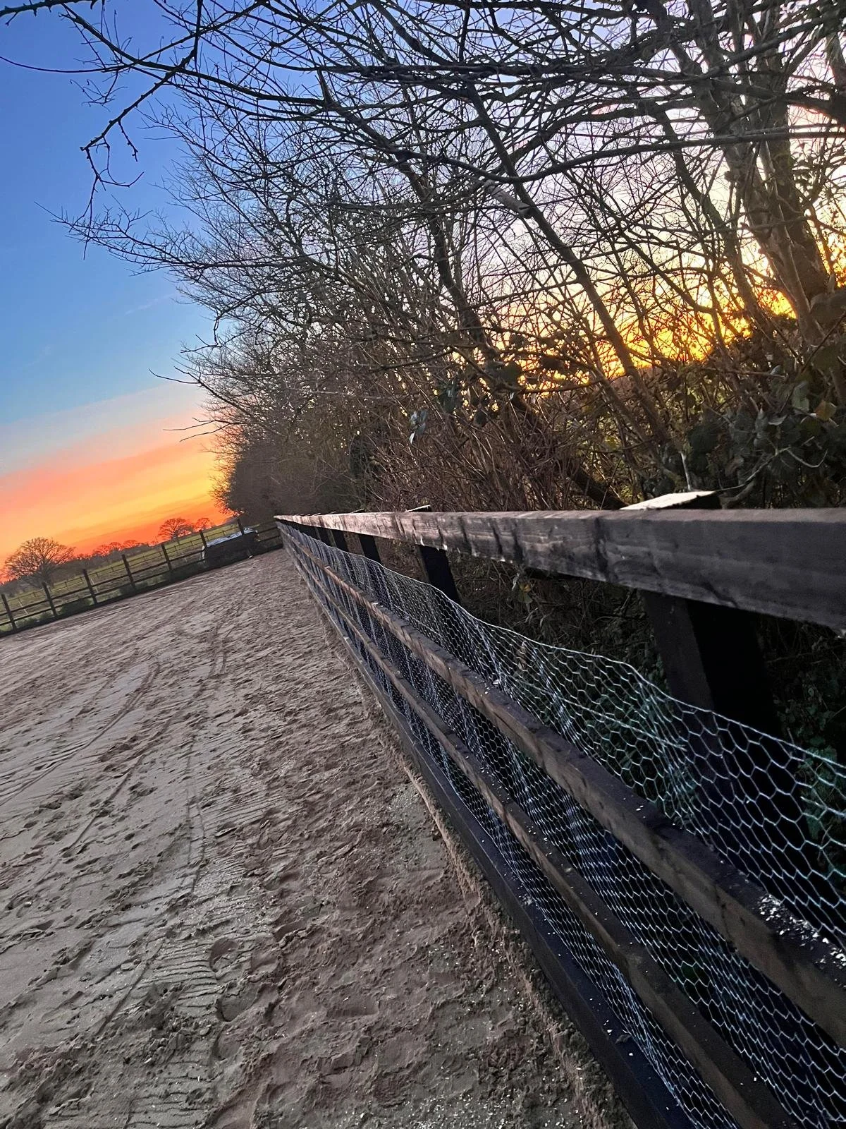 early morning sunrise over a frosty menage build. 