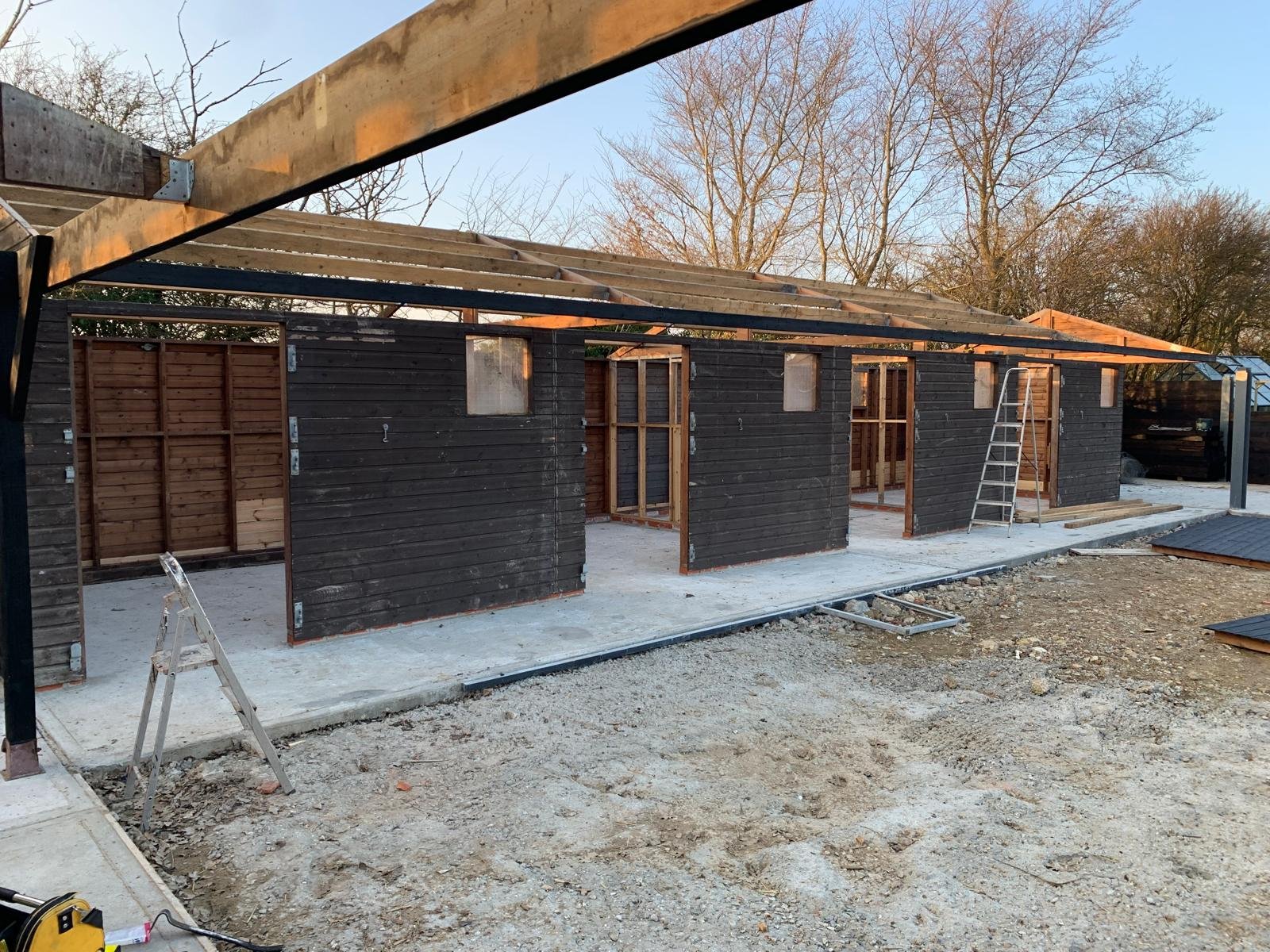 Stables moved from one site to the next going up for a customer. 