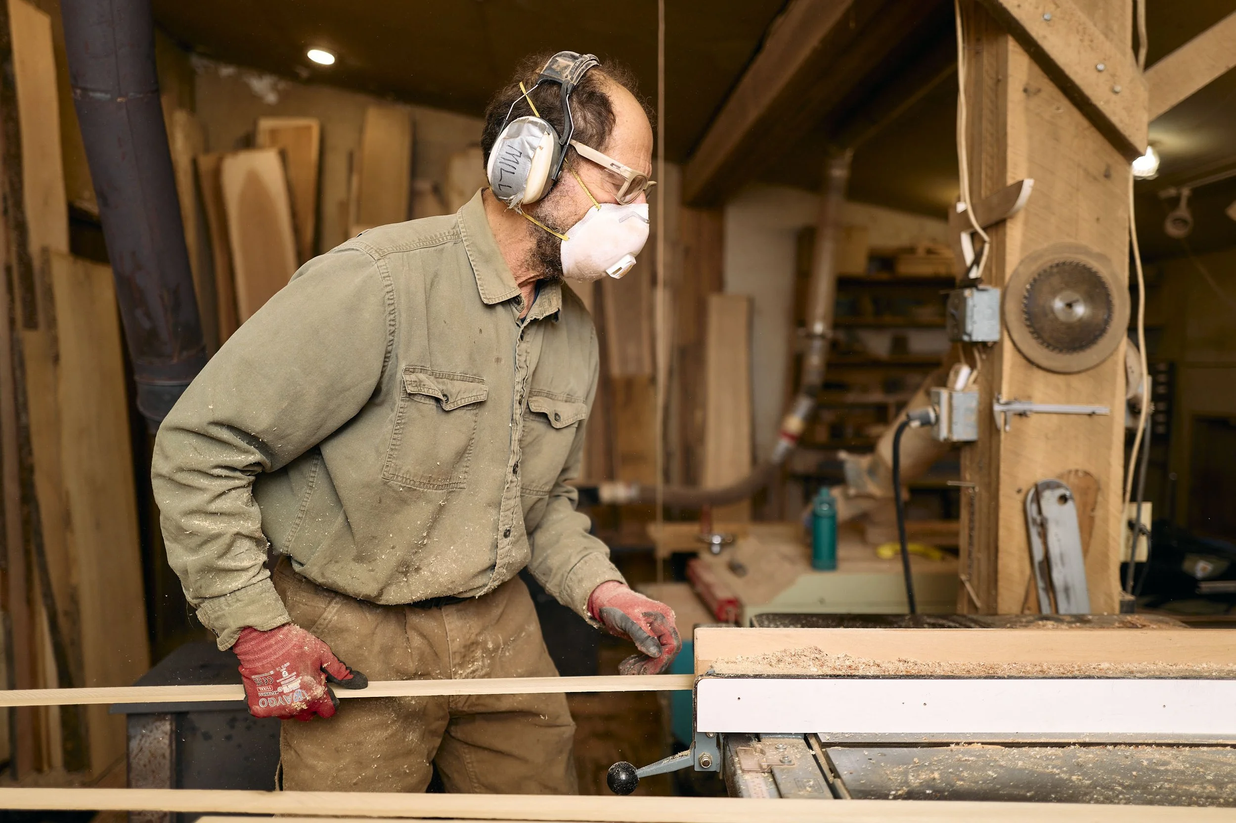 Mark is shown cutting millwork