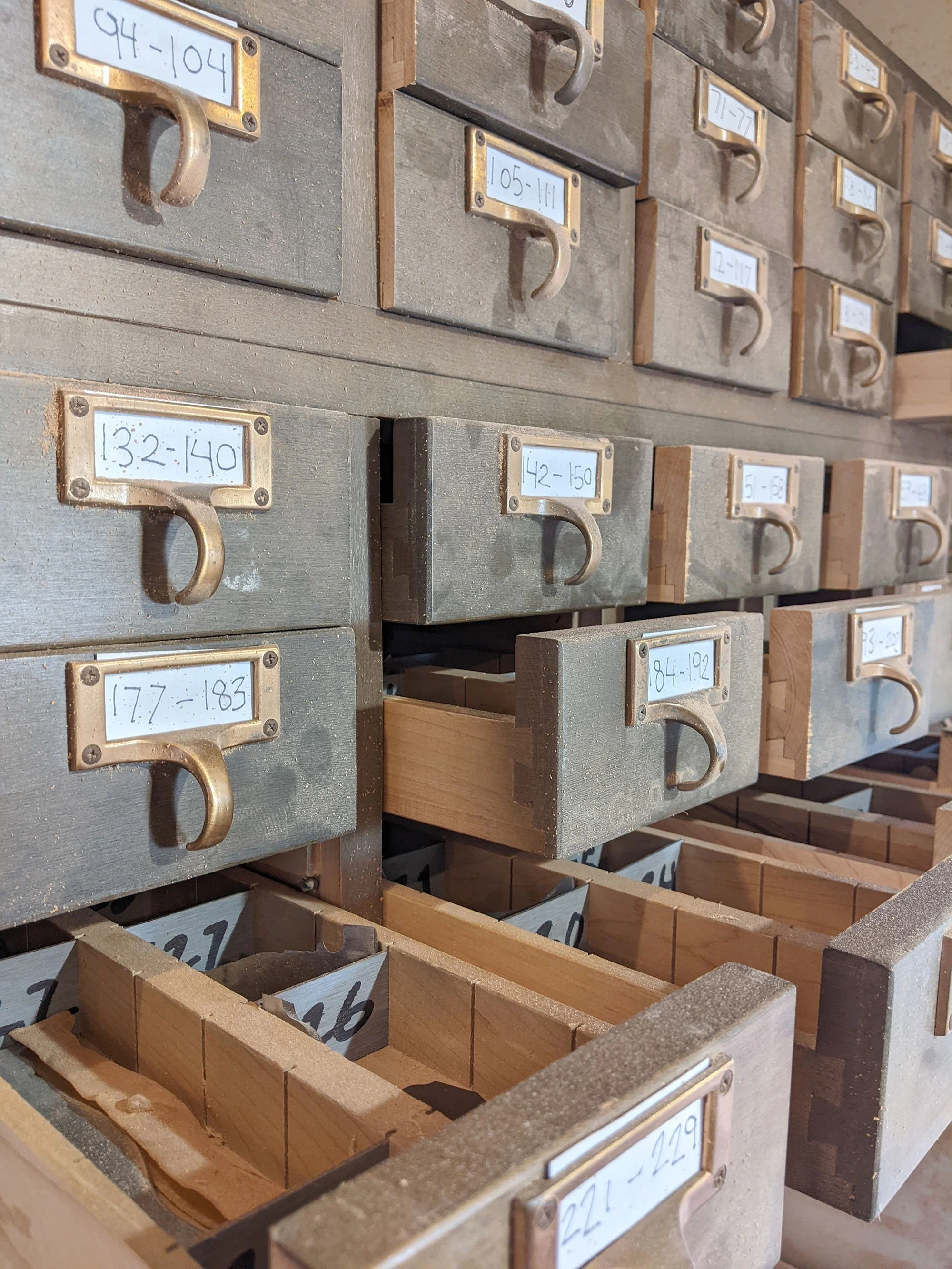 Work bench drawers that hold more than one hundred tools for custom milling.