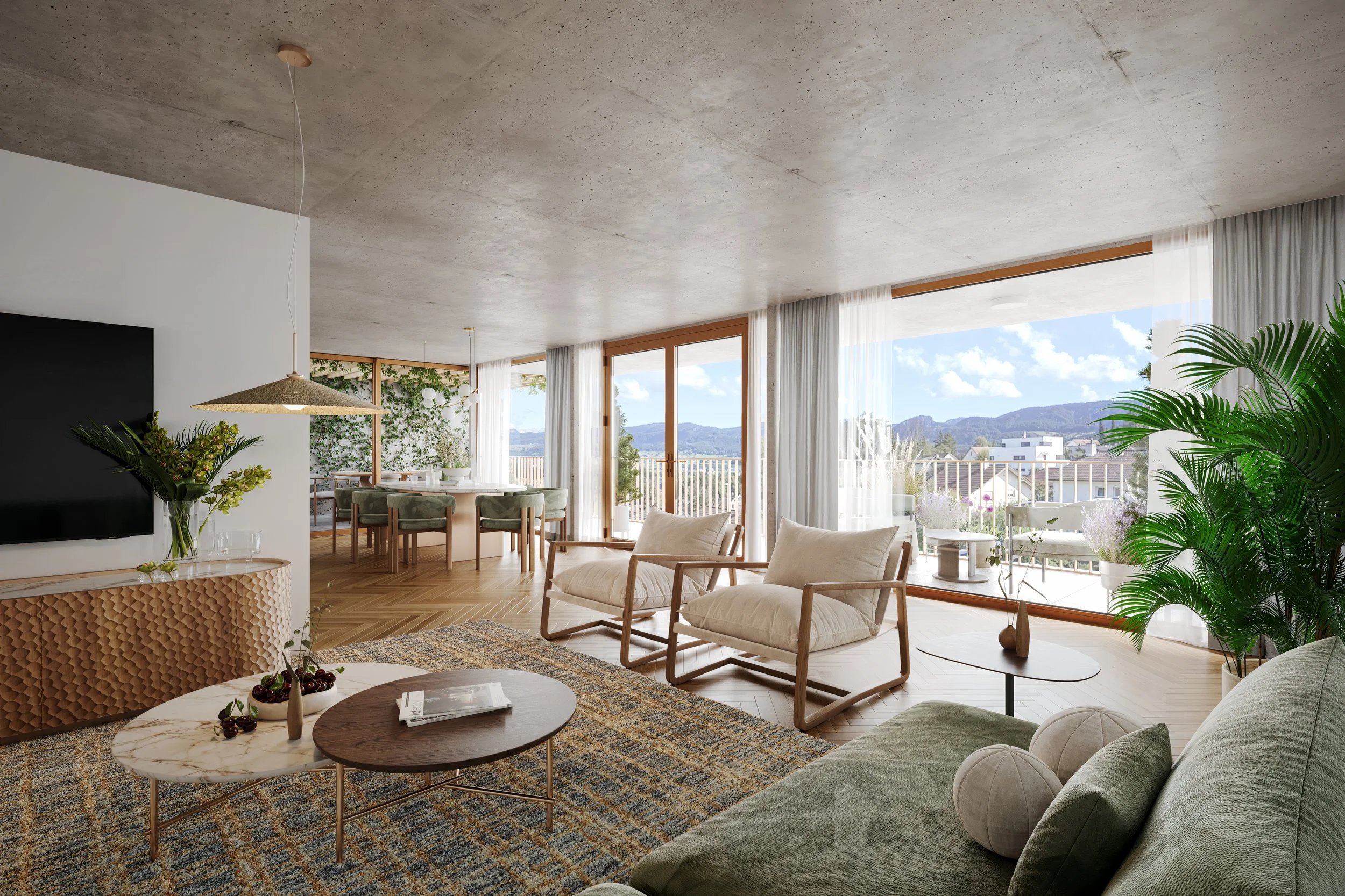 Modern living room with large windows and mountain view, featuring beige sofas, armchairs, coffee table, TV, dining area, indoor plants, and a balcony with outdoor seating.