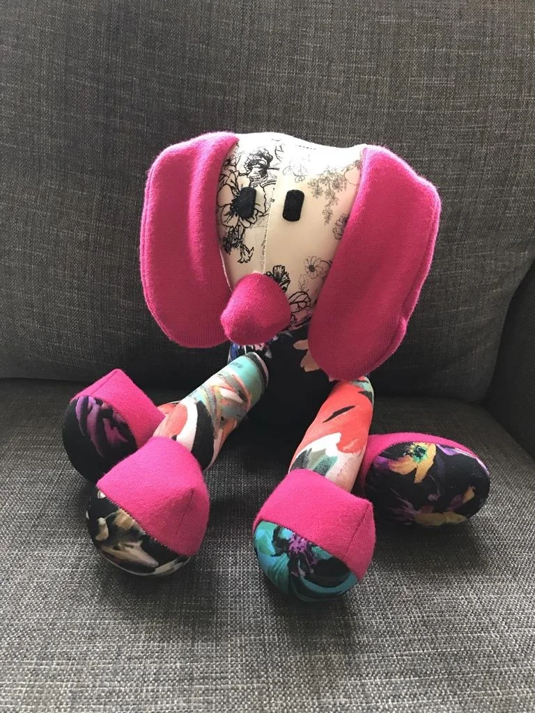 A keepsake dog made from Mum's clothing