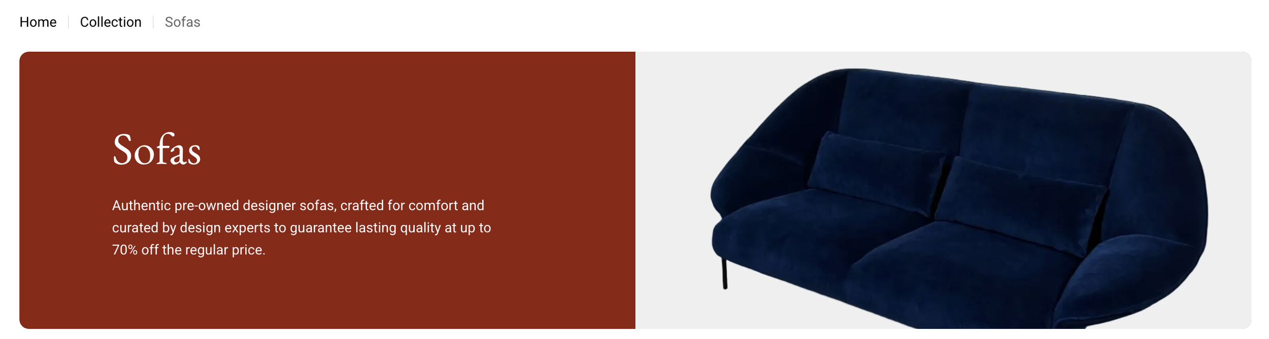 A navy blue modern sofa with cushions, viewed from the side, on a white background.