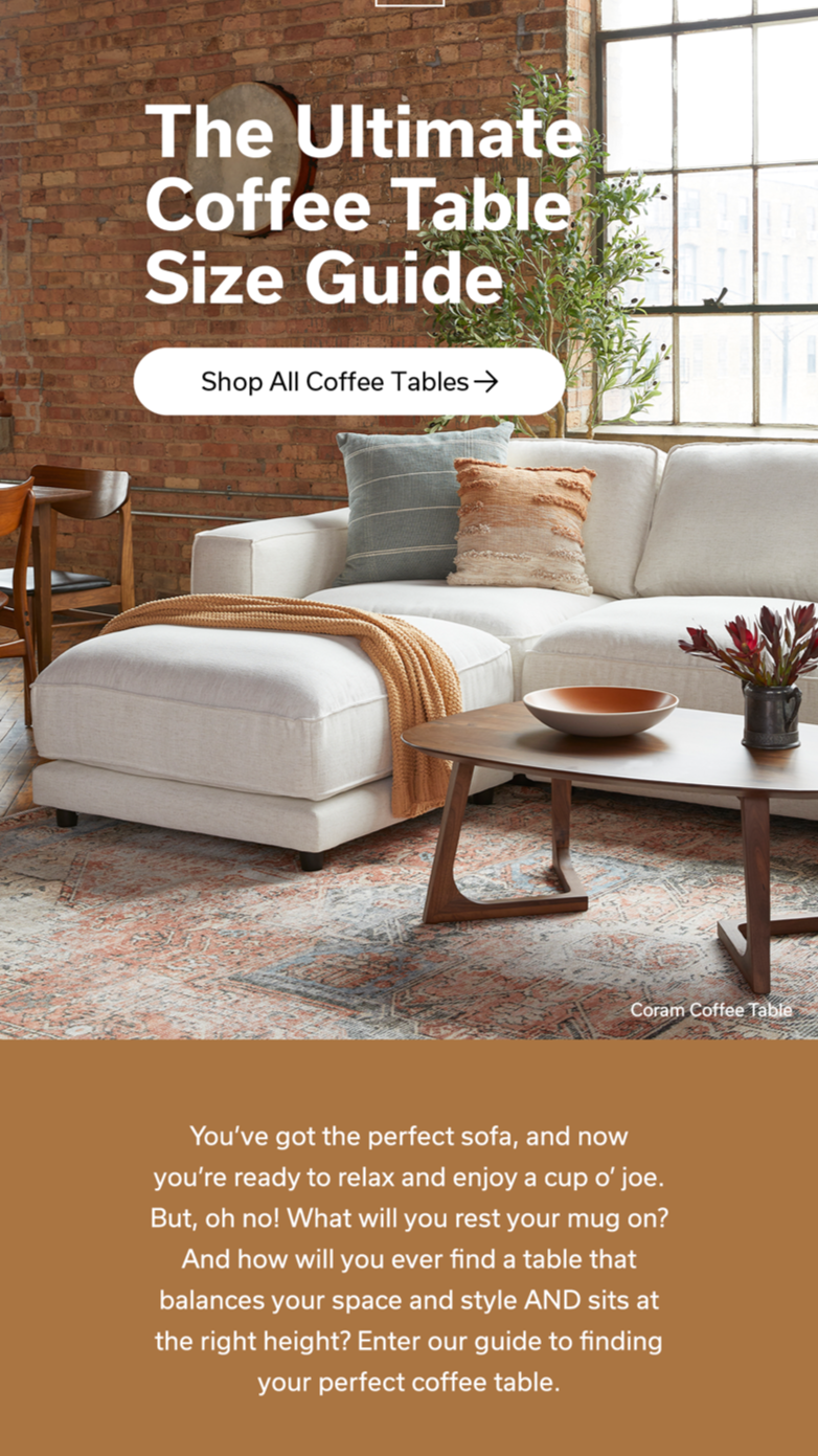 A cozy living room with a beige sofa, throw pillows, a wooden coffee table with a bowl and plant, a brick wall, a large window, and a potted plant. Text overlay reads 'The Ultimate Coffee Table Size Guide' and a button says 'Shop All Coffee Tables'.