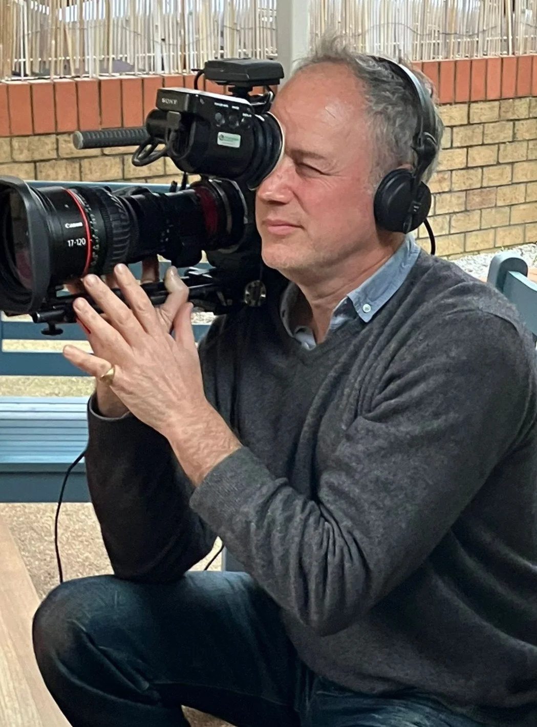 BAFTA winning camera operator Luke Hallam, filming a Care Story film in a care setting