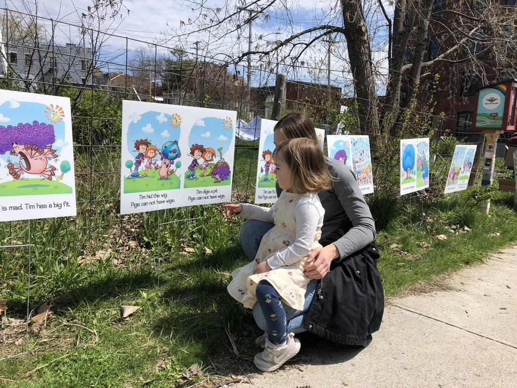 mom and child at decodable book walk