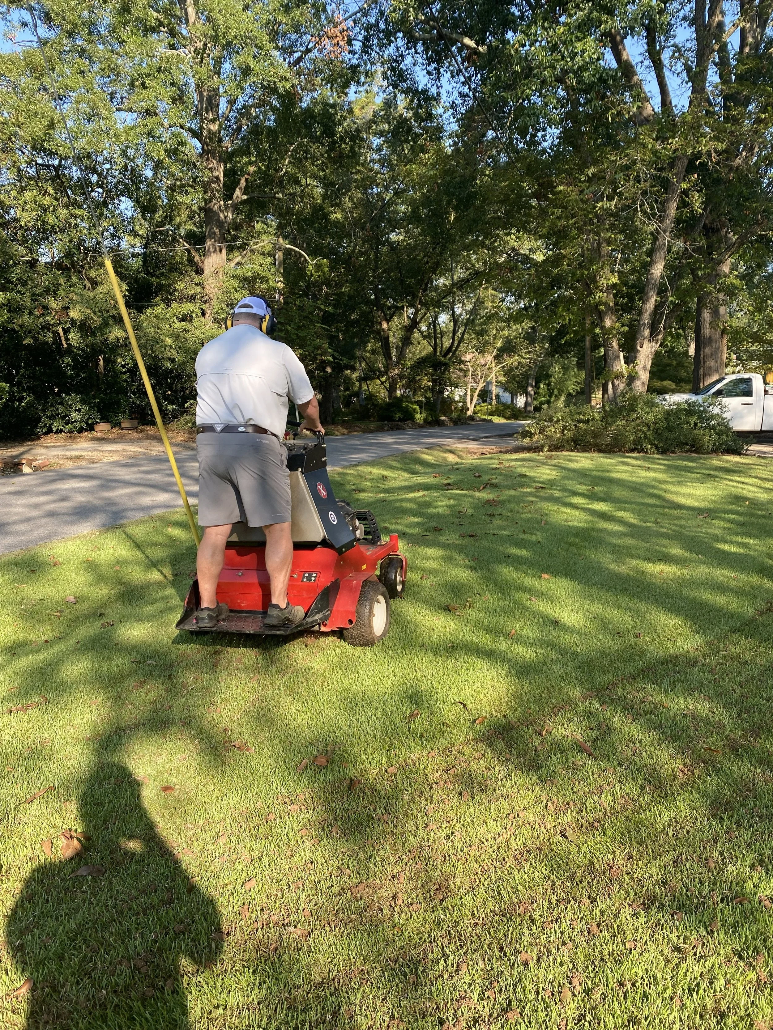 Aerating a lawn with a ride on aerator